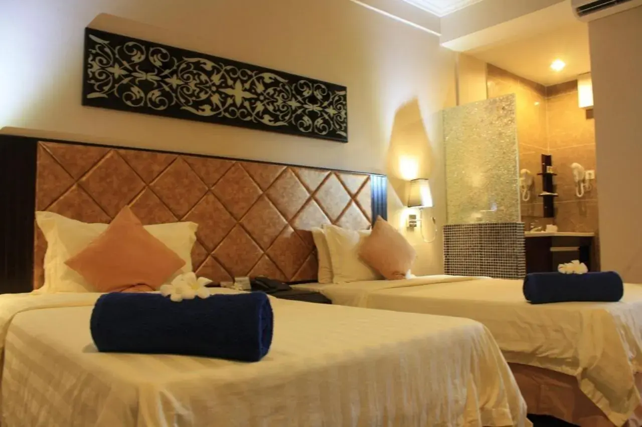 Bed in Beringgis Beach Resort & Spa