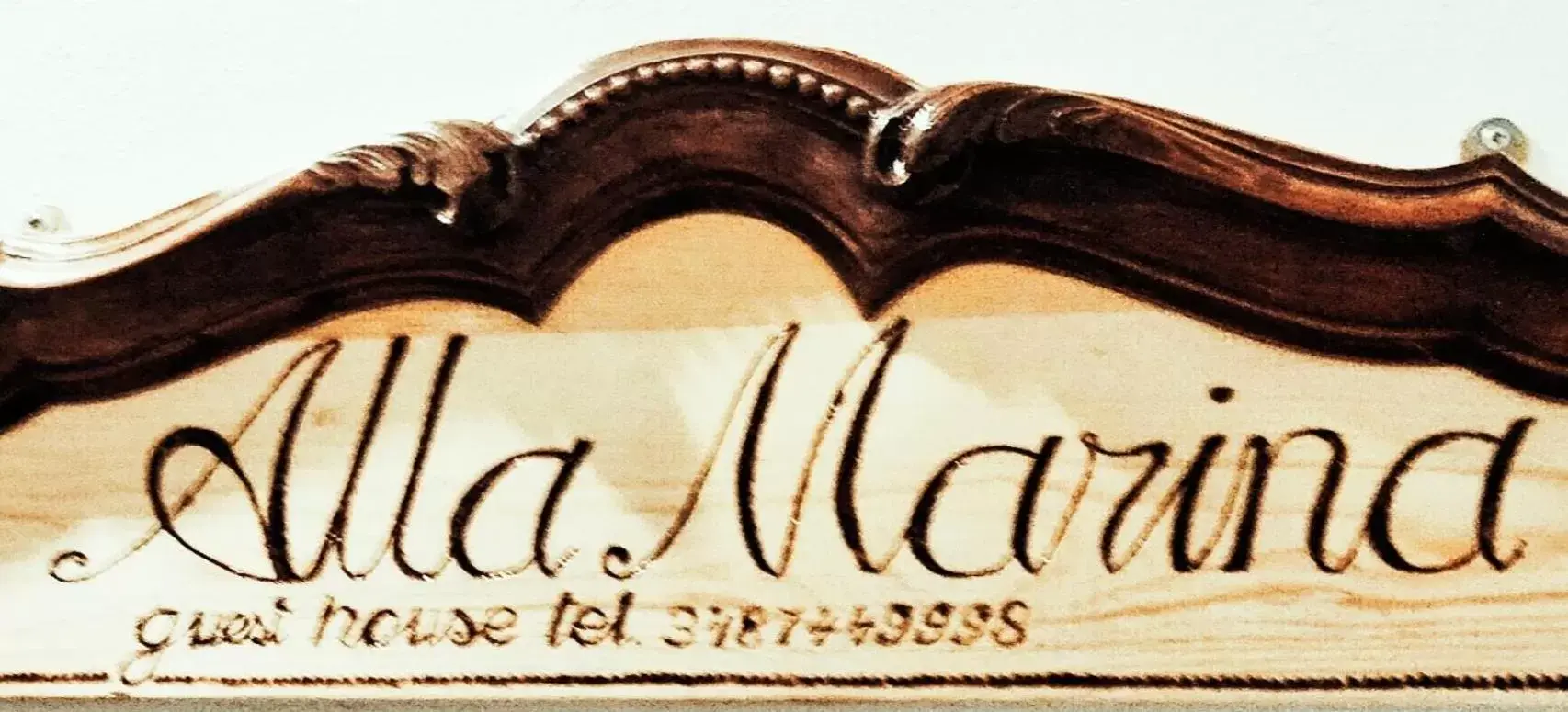 Property Logo/Sign in Alla Marina