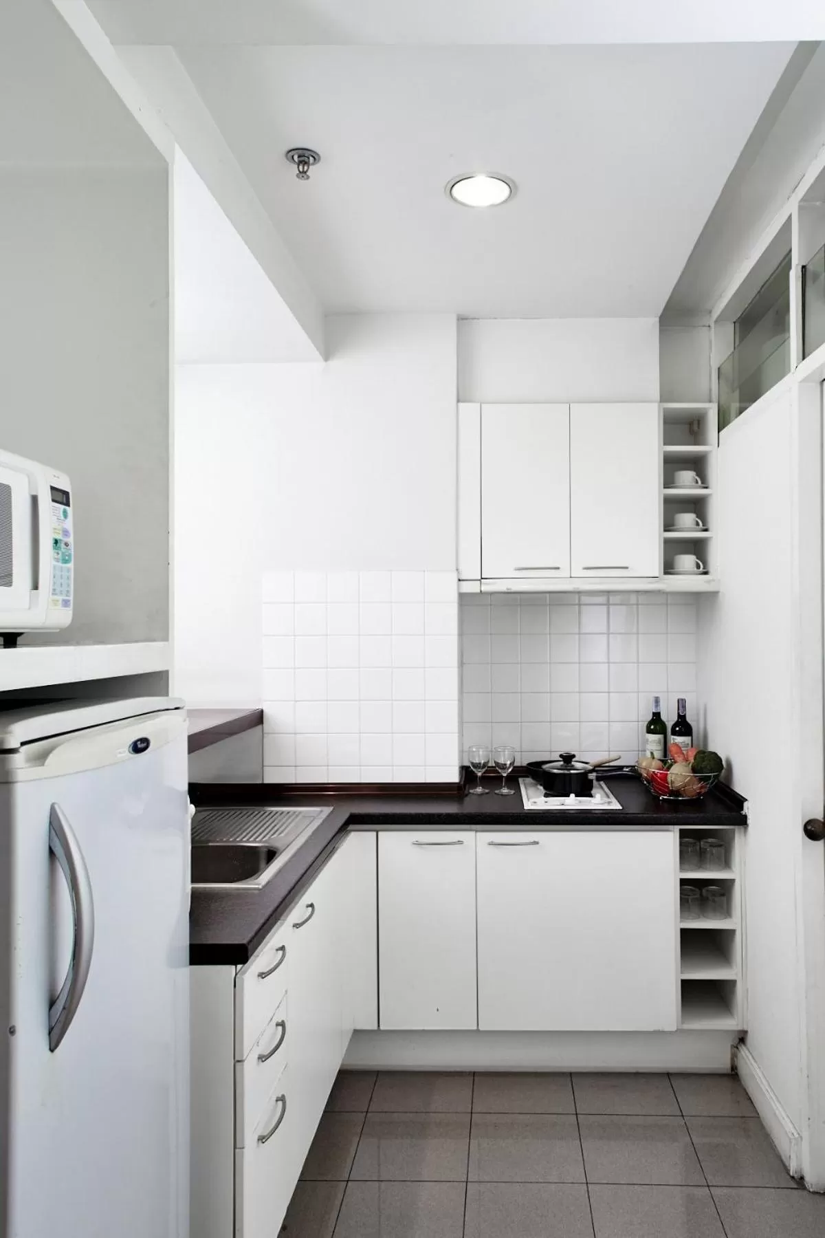 Kitchen or kitchenette in Riverine Place Hotel and Residence