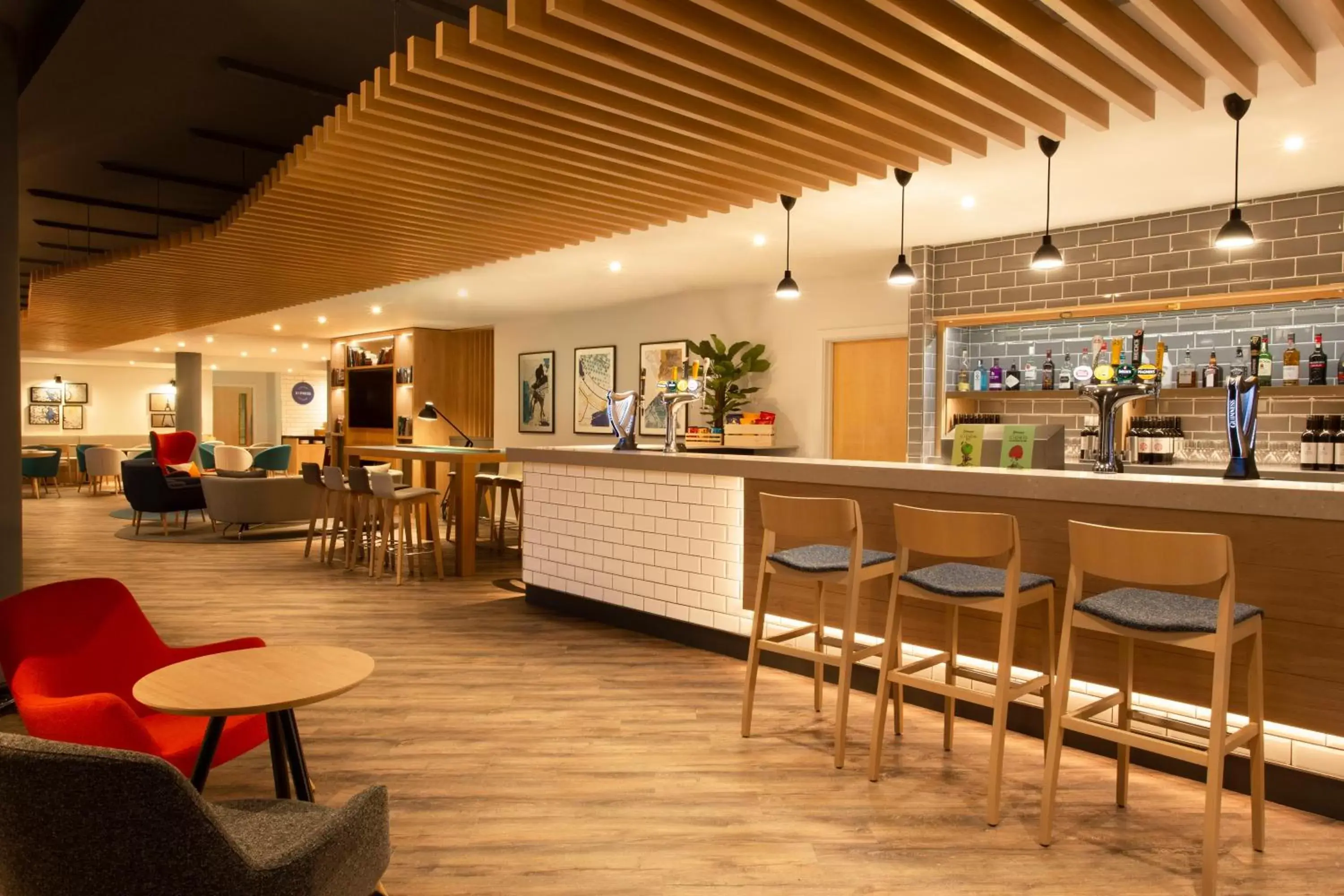 Lounge or bar in Holiday Inn Express Cheltenham Town Centre by IHG Lounge or bar in Holiday Inn Express Cheltenham Town Centre by IHG