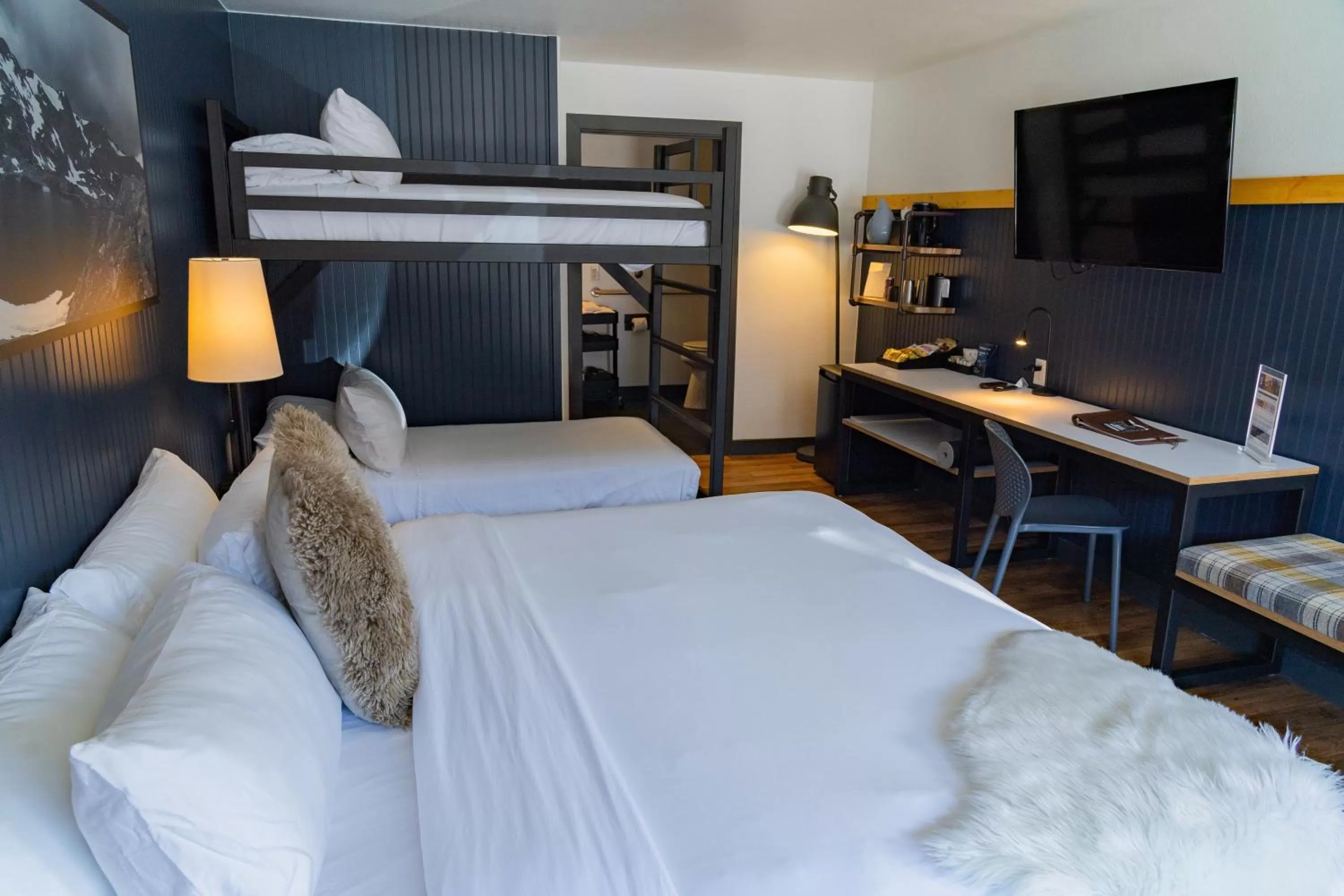 Photo of the whole room, Bed in Gravity Haus Winter Park