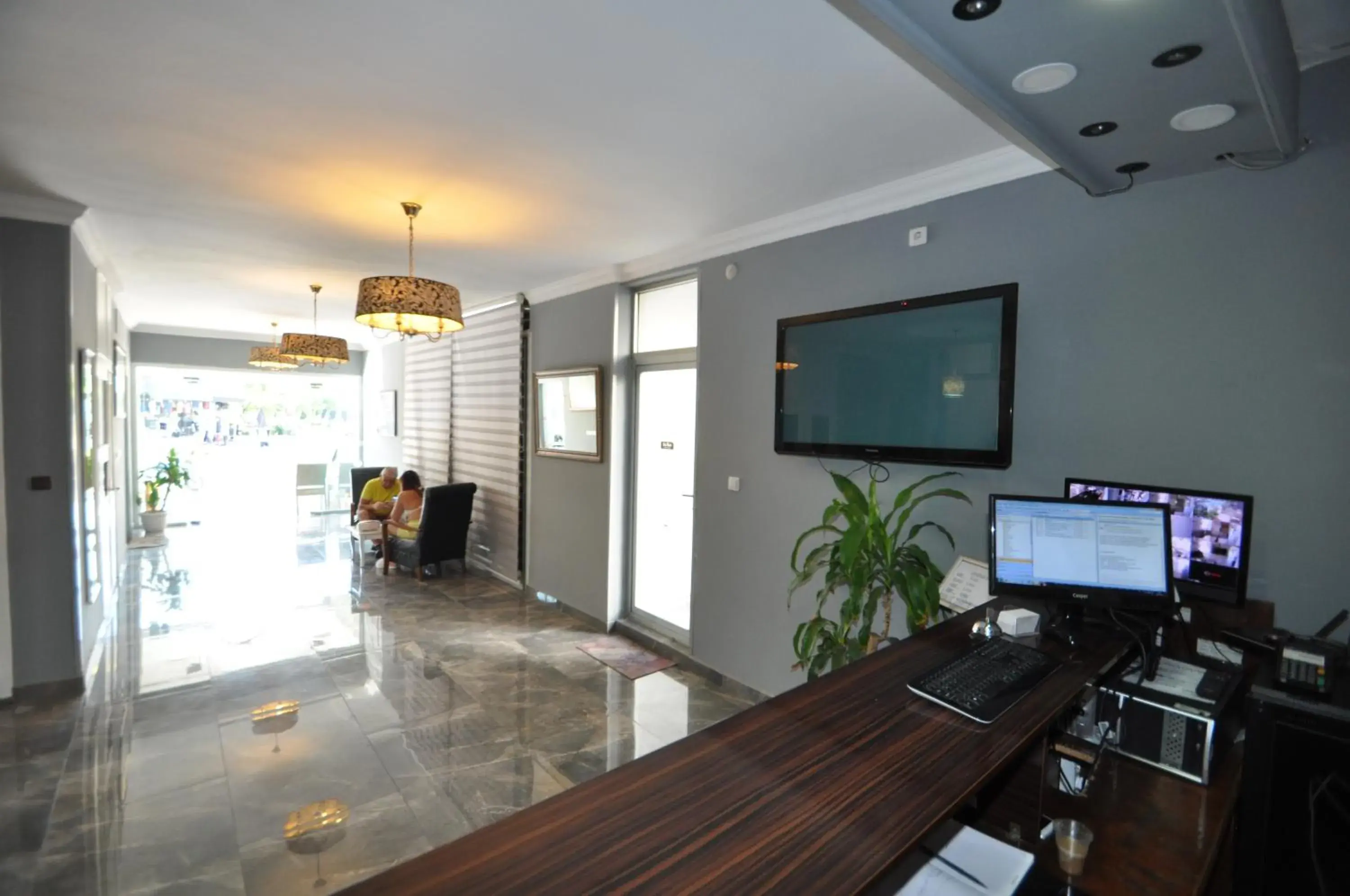 Lobby or reception, TV/Entertainment Center in Reis Maris Hotel