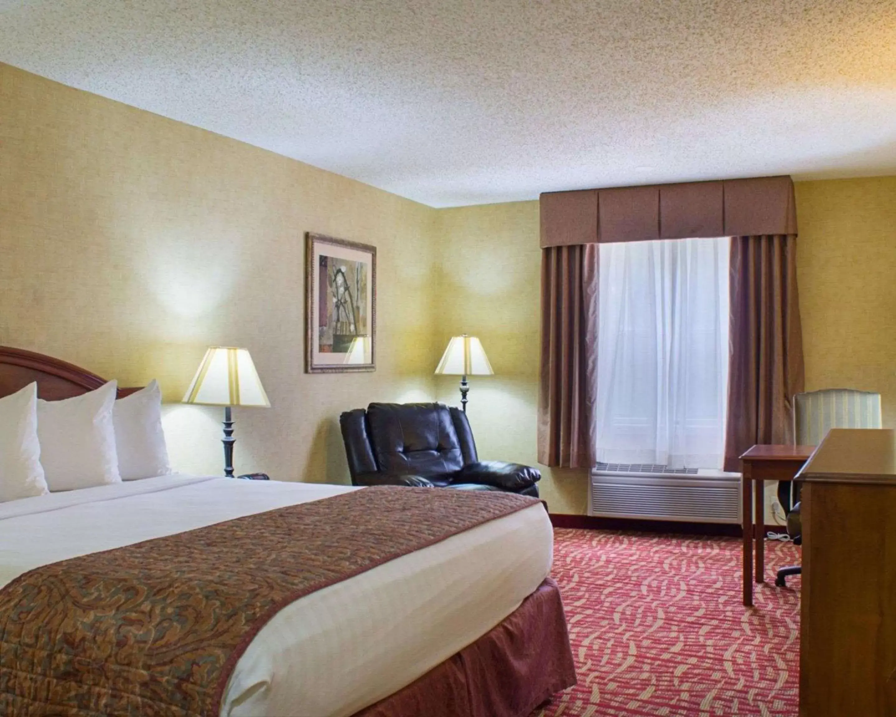 Photo of the whole room, Bed in Rodeway Inn Columbia Mall Loop