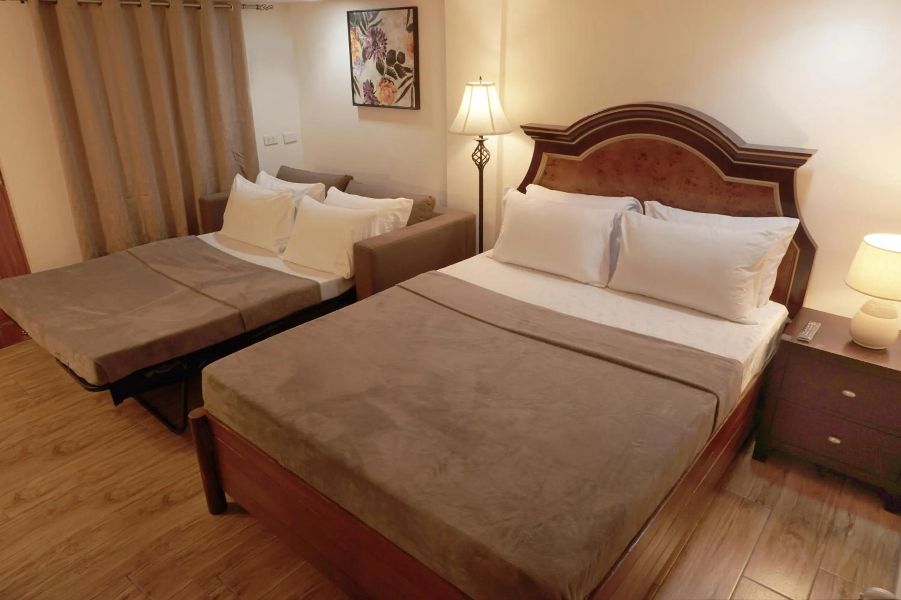 Bed in 1775 Adriatico Suites