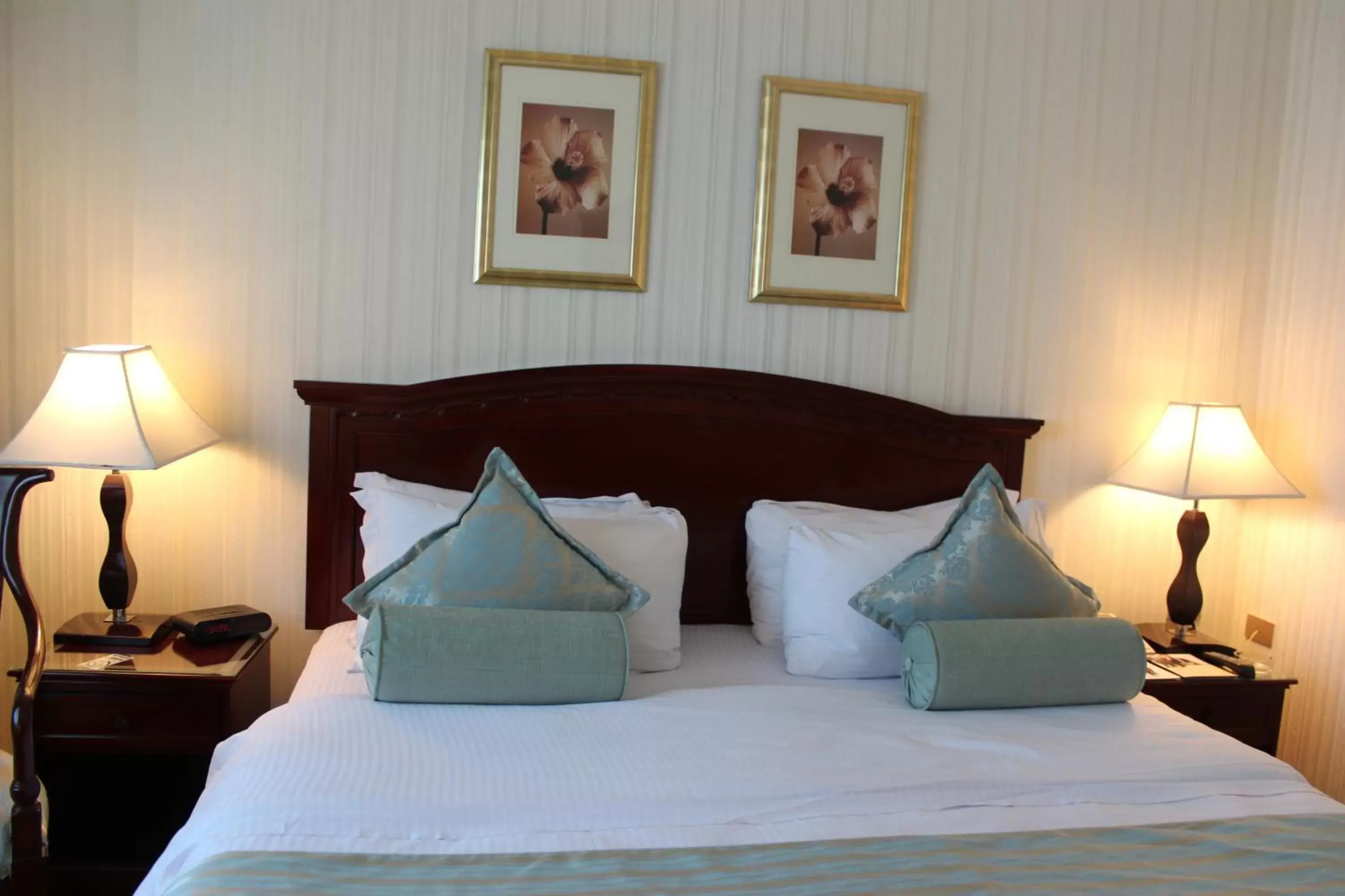 Bed in Swiss Al Hamra Hotel