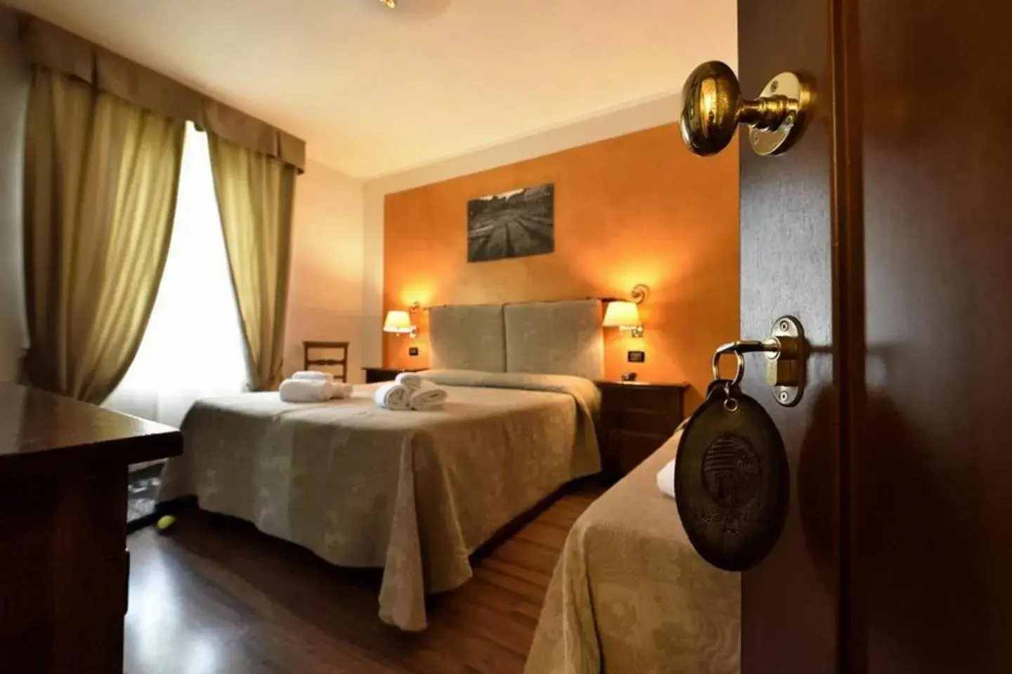 Photo of the whole room, Bed in Hotel Arcobaleno Siena