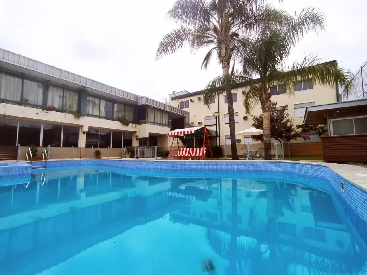 Swimming pool in Gran Lourdes Hotel by CPH