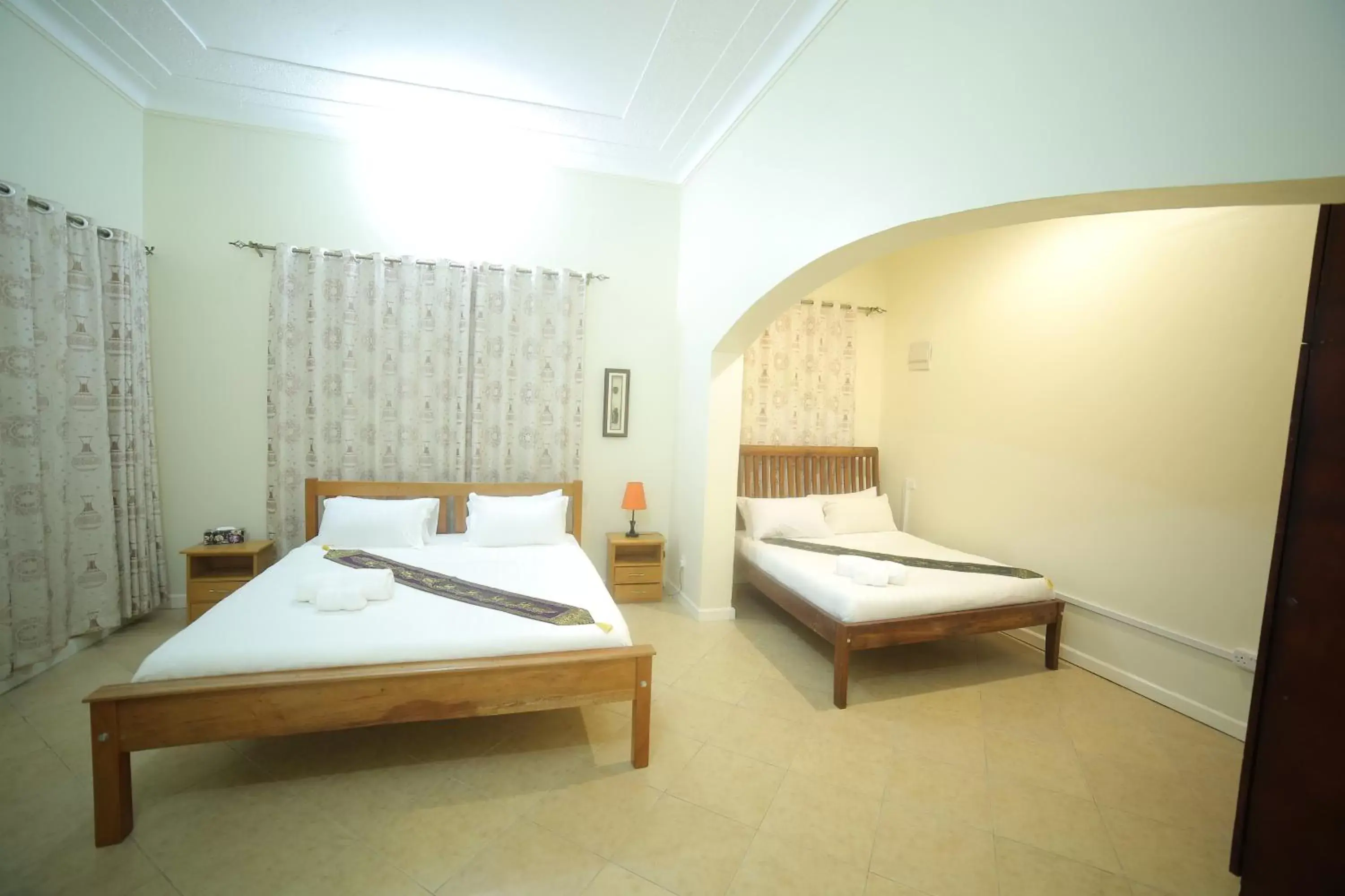King Room with Two King Beds in Entebbe Palm Hotel King Room with Two King Beds in Entebbe Palm Hotel