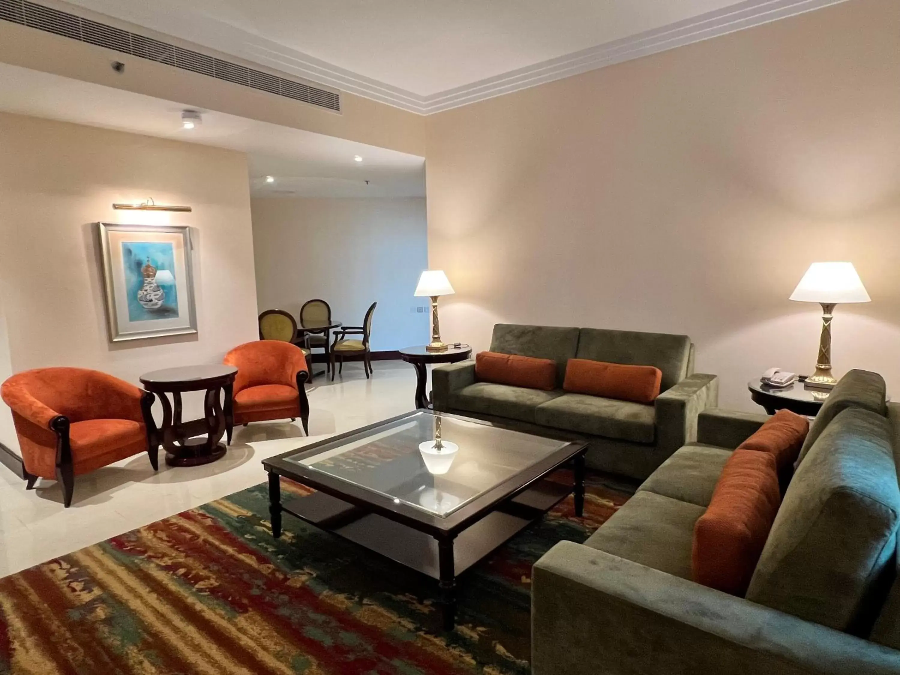 Living room, Seating Area in City Seasons Suites