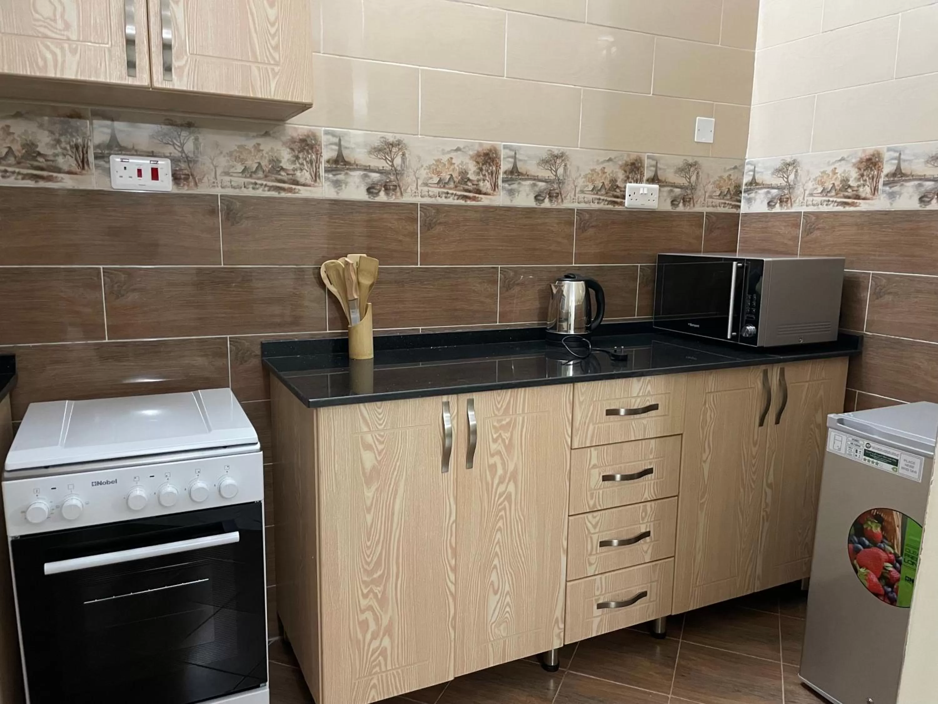 Kitchen or kitchenette in Jaffa Suites