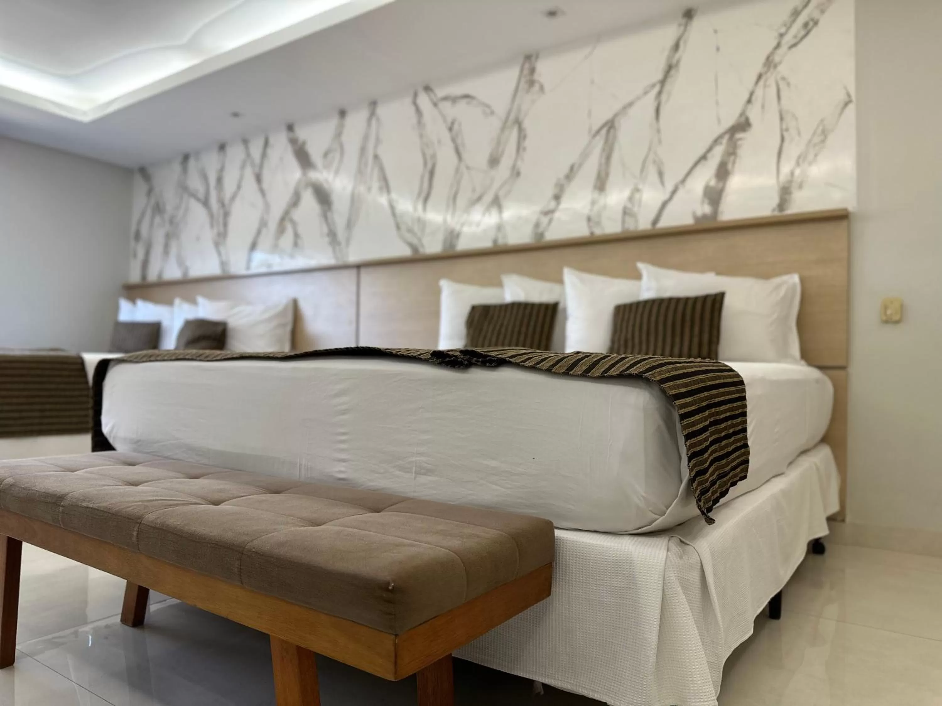 Bed in Atrium Confort Hotels