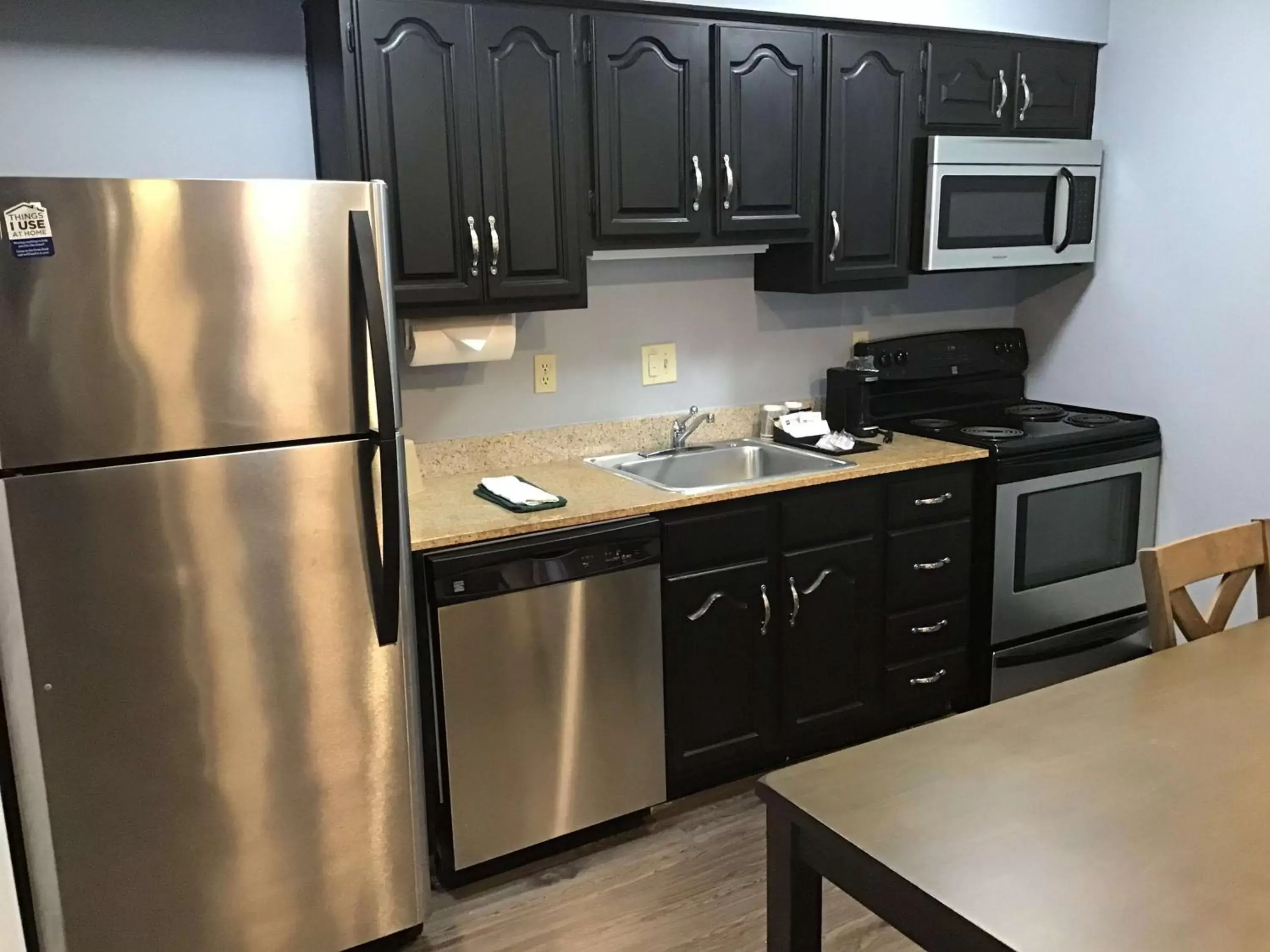 Kitchen or kitchenette, Kitchen/Kitchenette in SureStay Studio by Best Western Pensacola