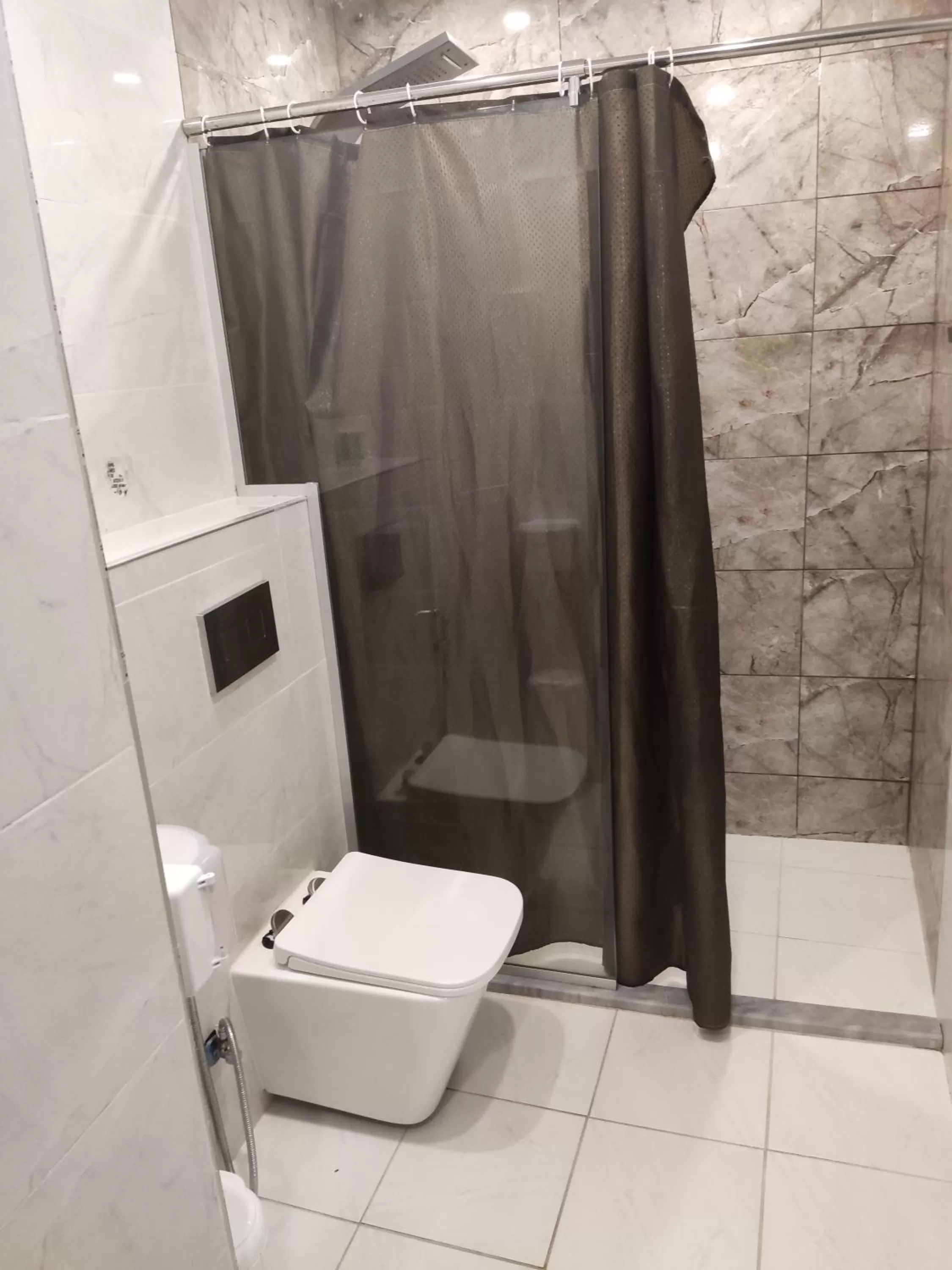 Bathroom in Golden Plaza Hotel