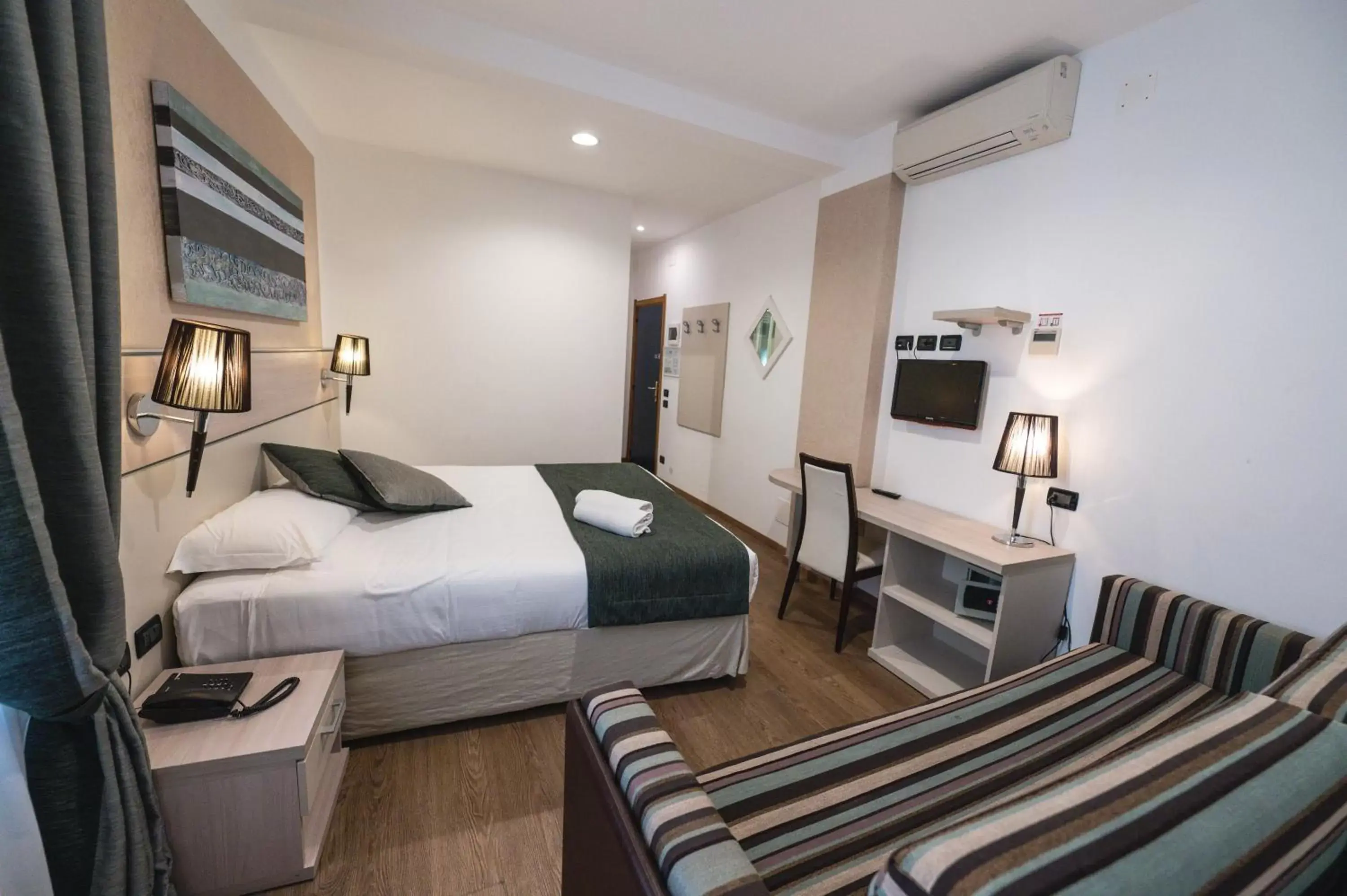 Photo of the whole room, Bed in Coccodrillo Hotel & Apartments