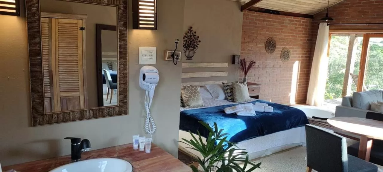 Bed in Pousada Serra do Luar