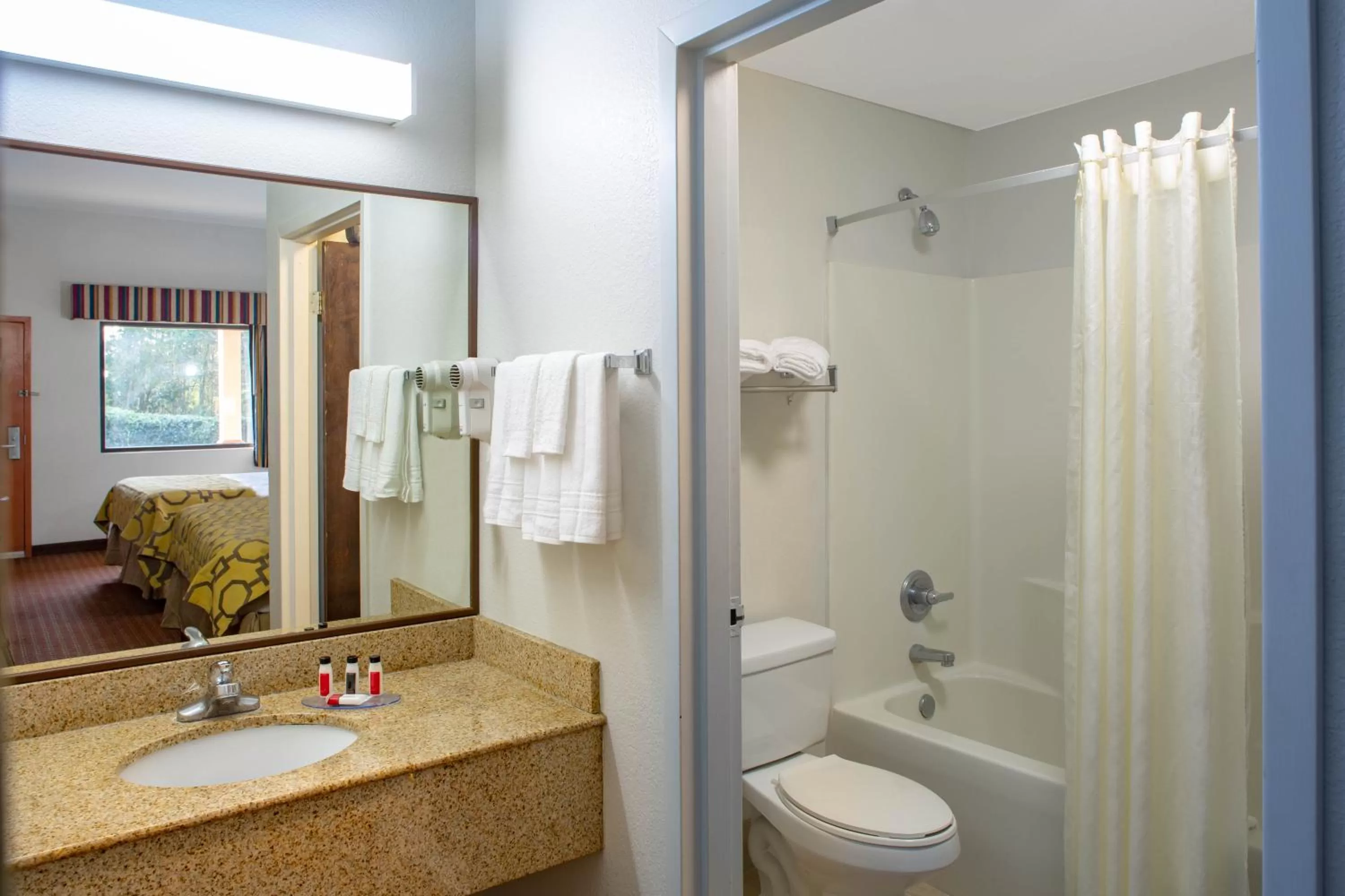 Toilet in Baymont by Wyndham Midway Tallahassee