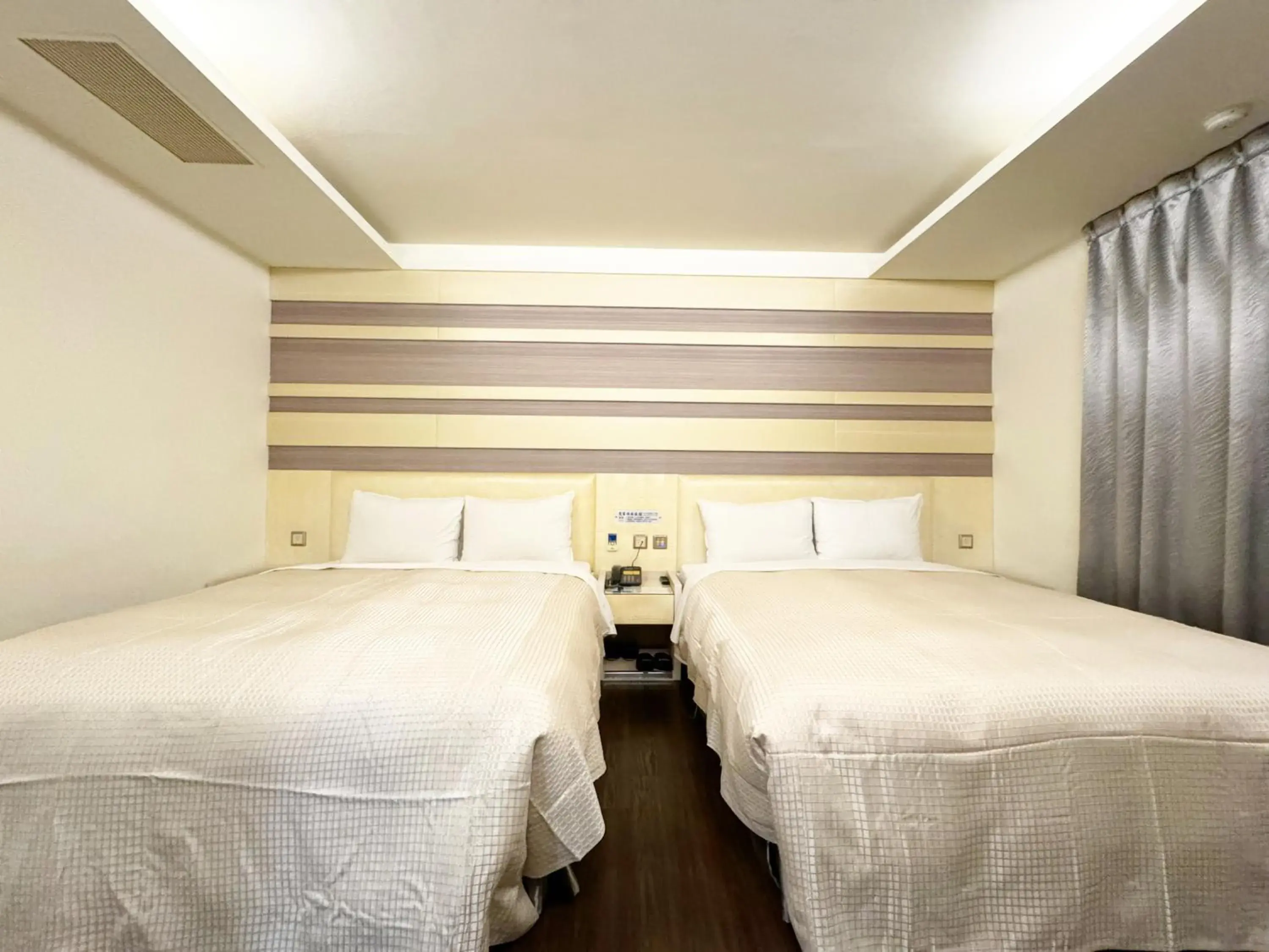 Photo of the whole room, Bed in Ai-Lai Fashion Hotel