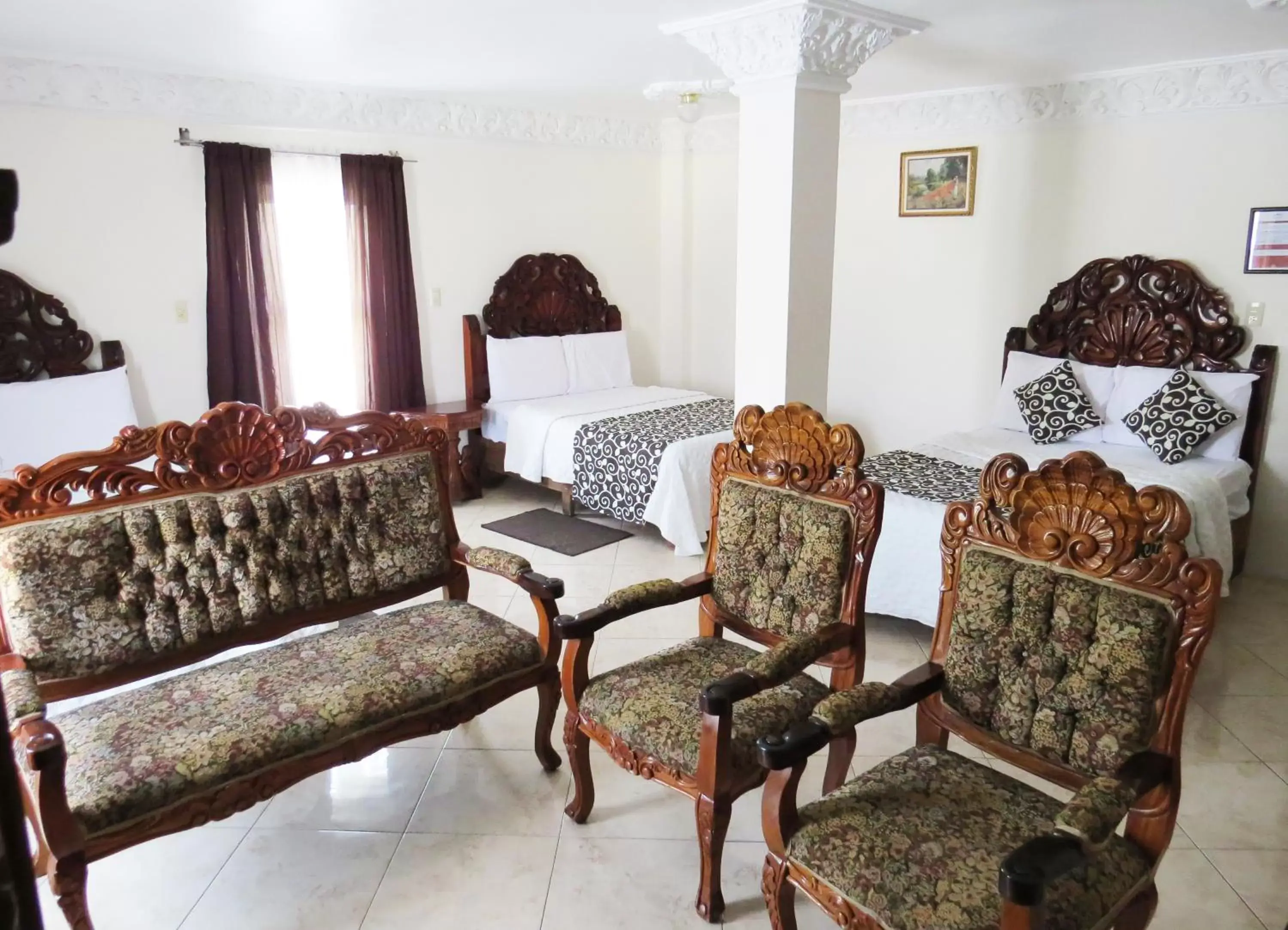 Bed, Seating Area in Hotel Royal Puebla