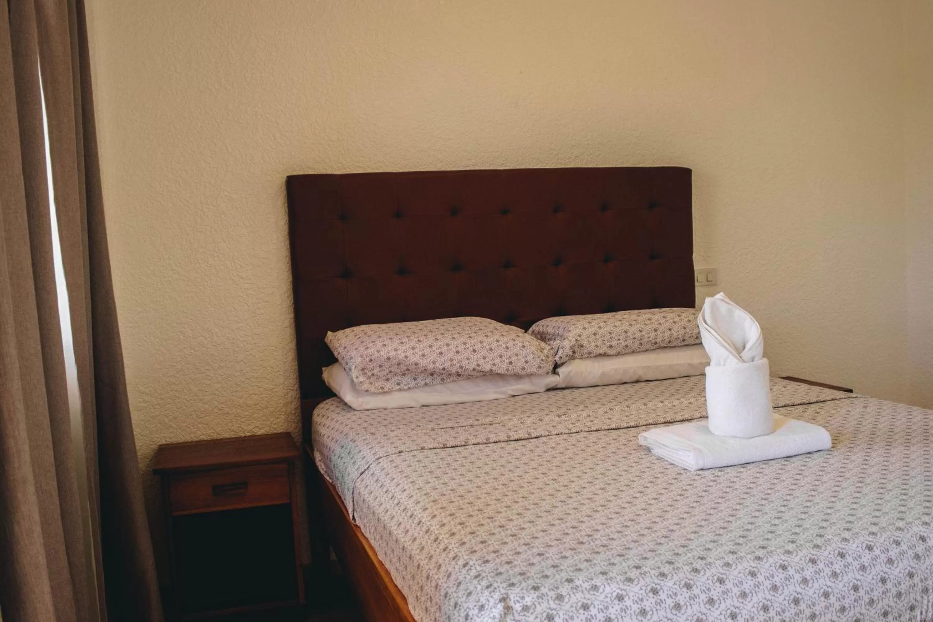 Bed in Jugalis Hotel and Restaurant