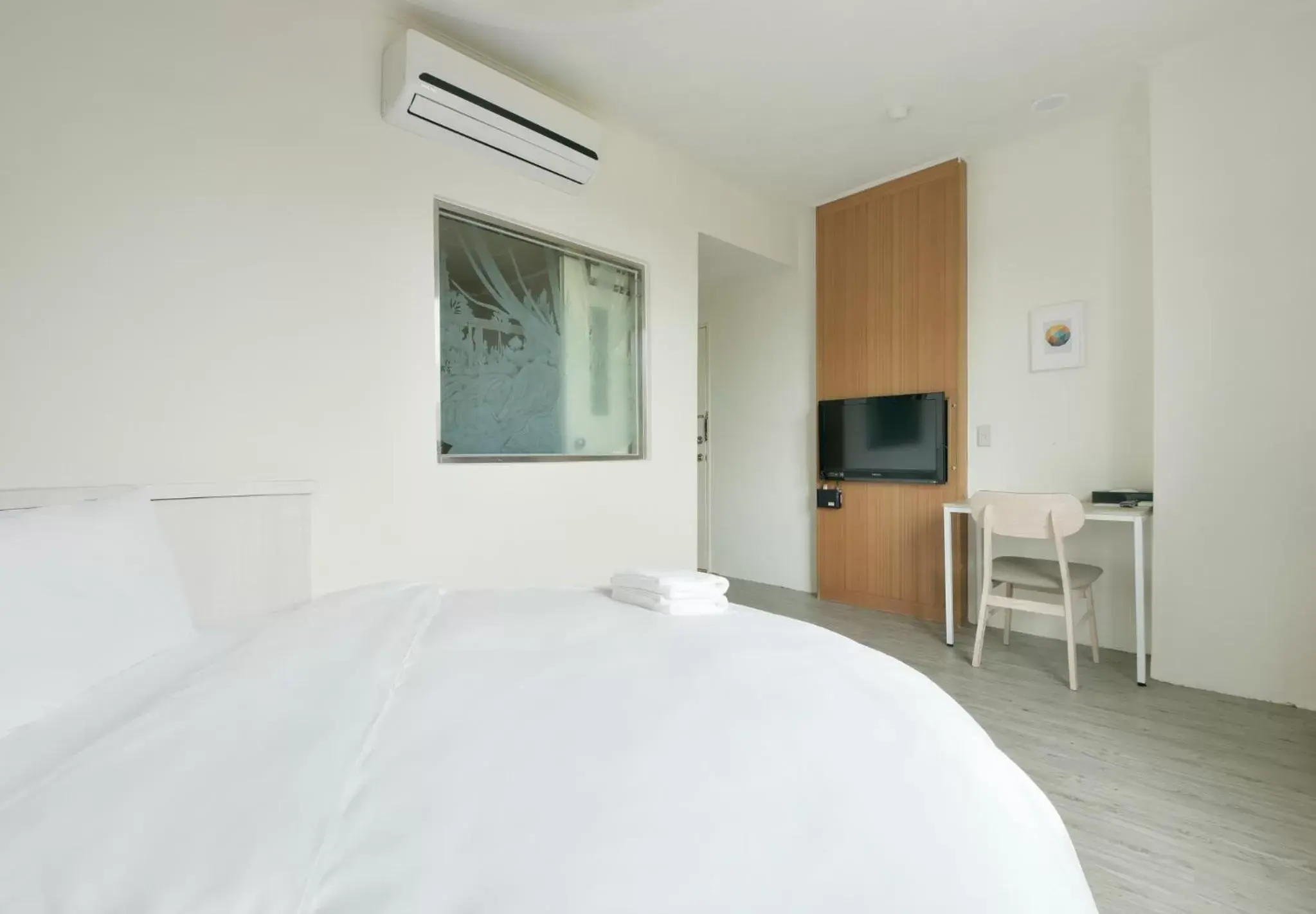 Bed in Raise Hotel Taichung