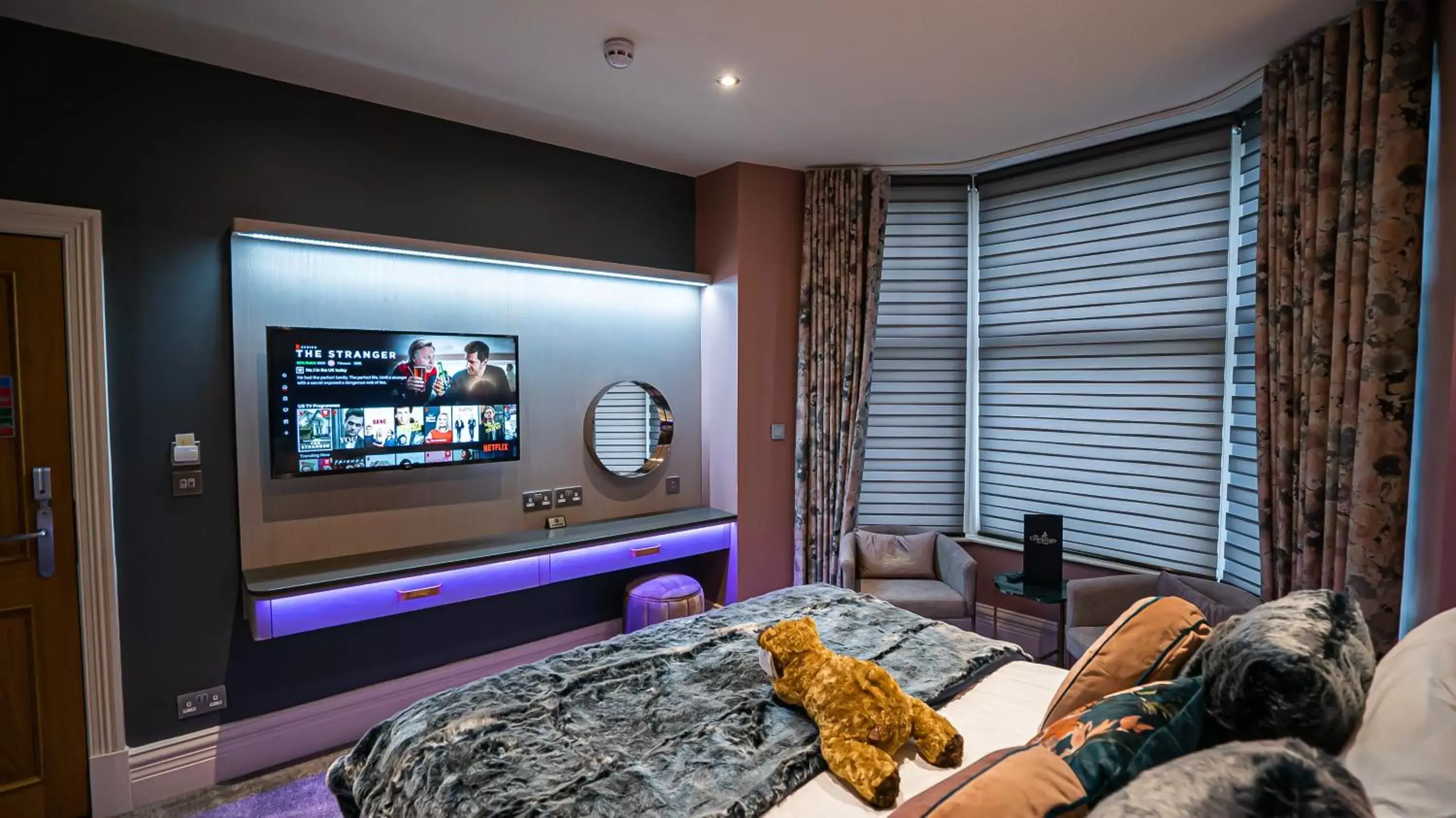 Bed, TV/Entertainment Center in The Cranleigh Boutique