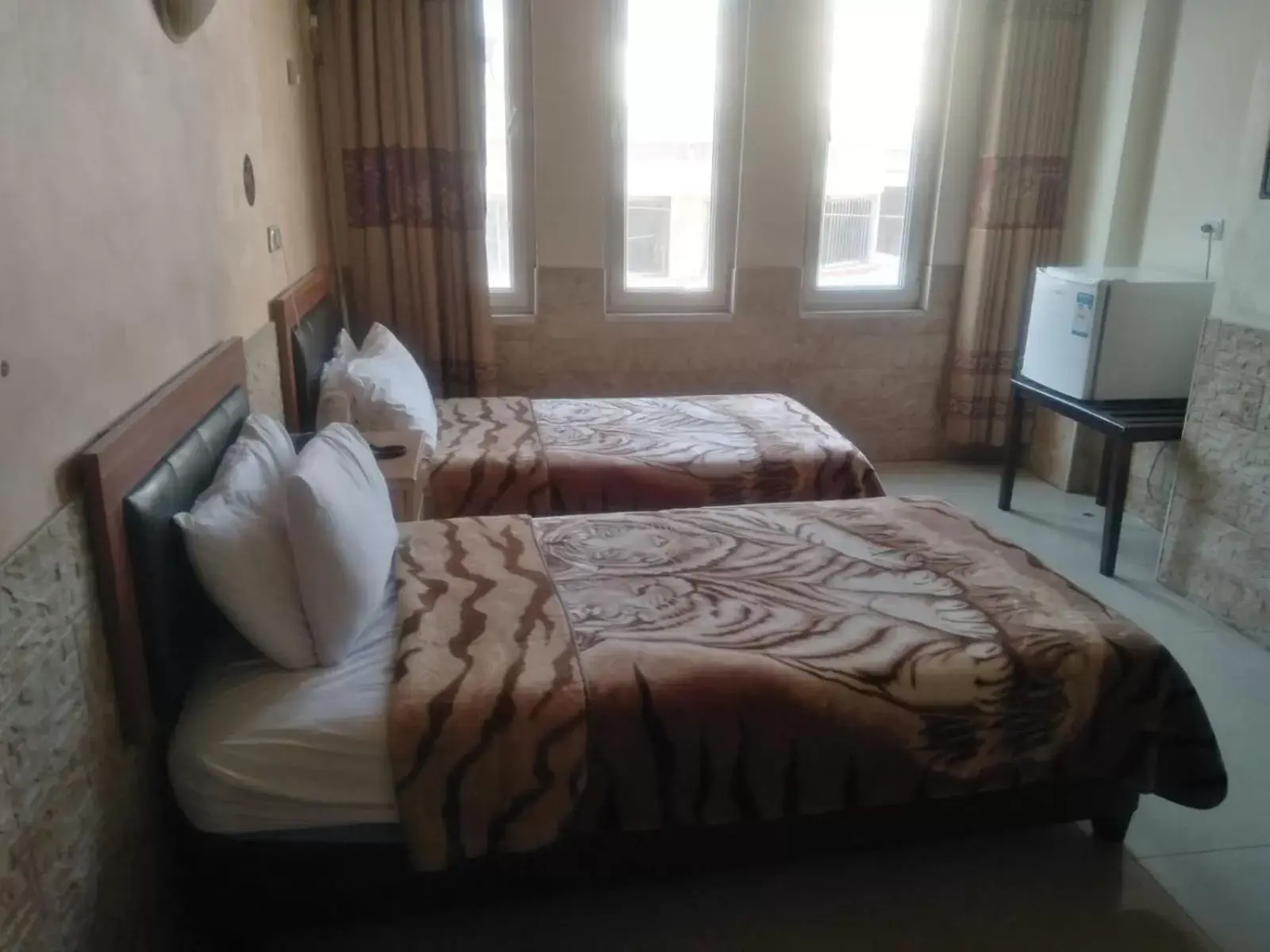 Bed in Amman Palace Hotel
