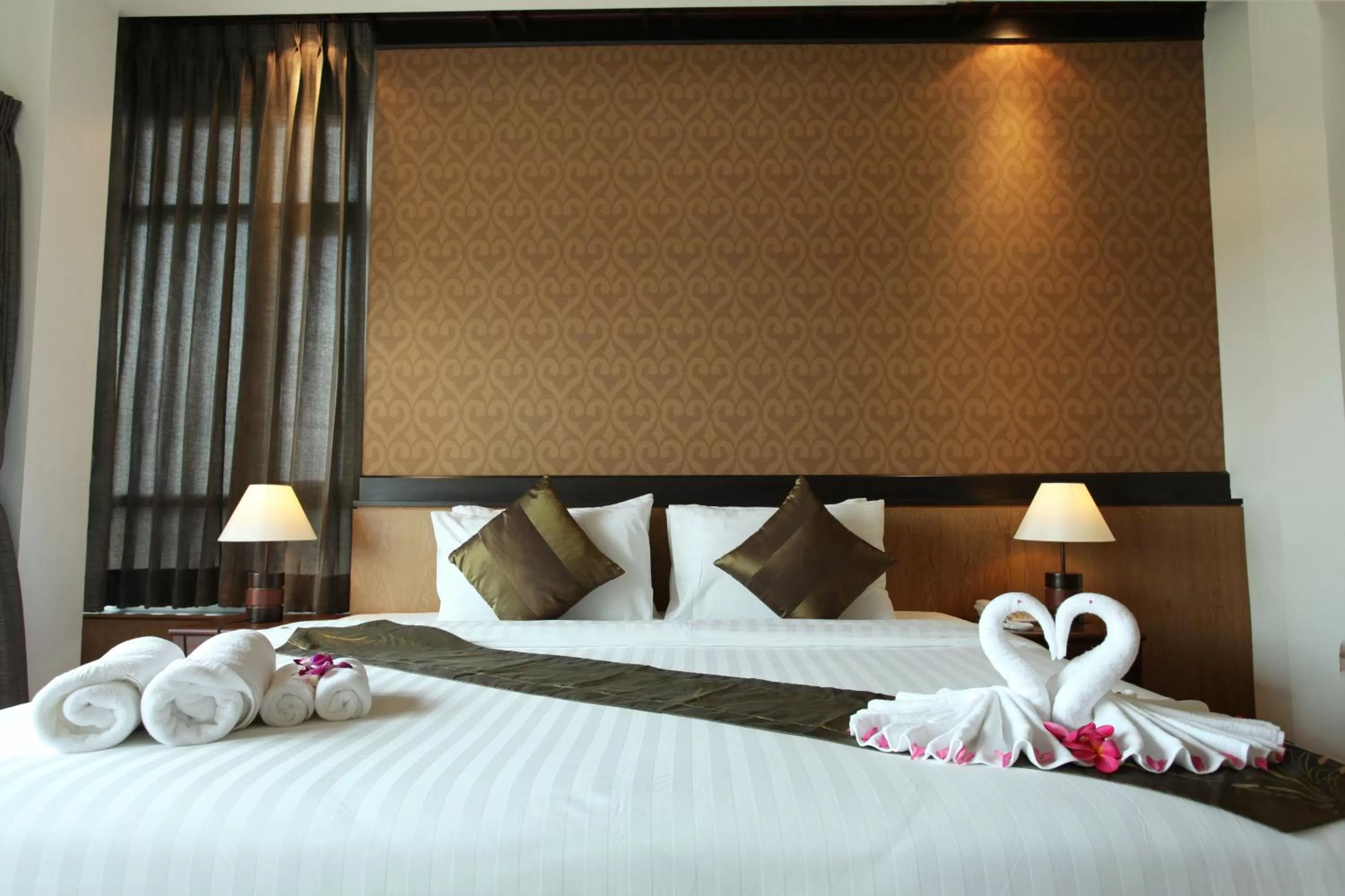 Decorative detail, Bed in Rapeepan Ville Hotel