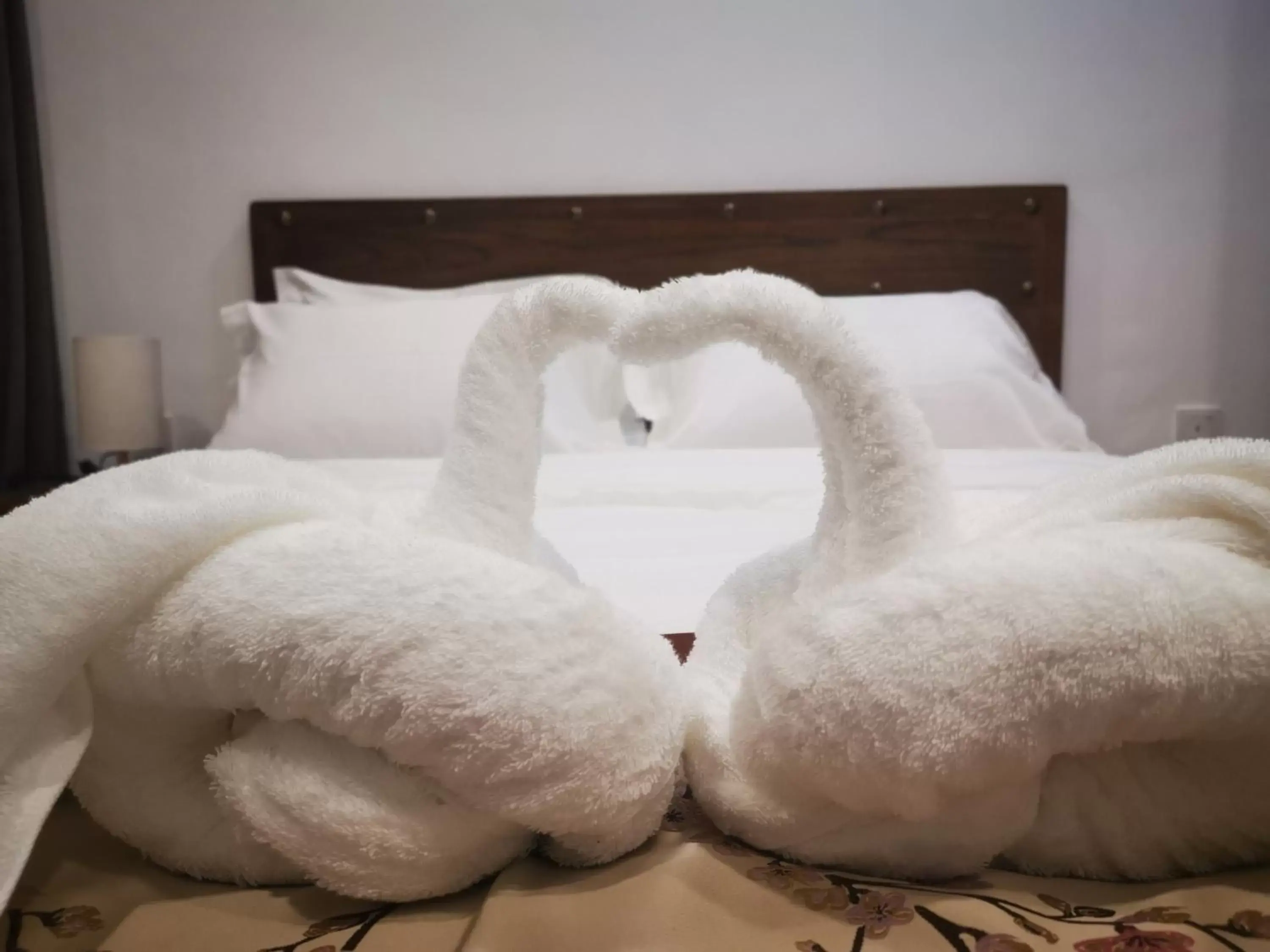 Decorative detail, Bed in Mclane Boutique Hotel