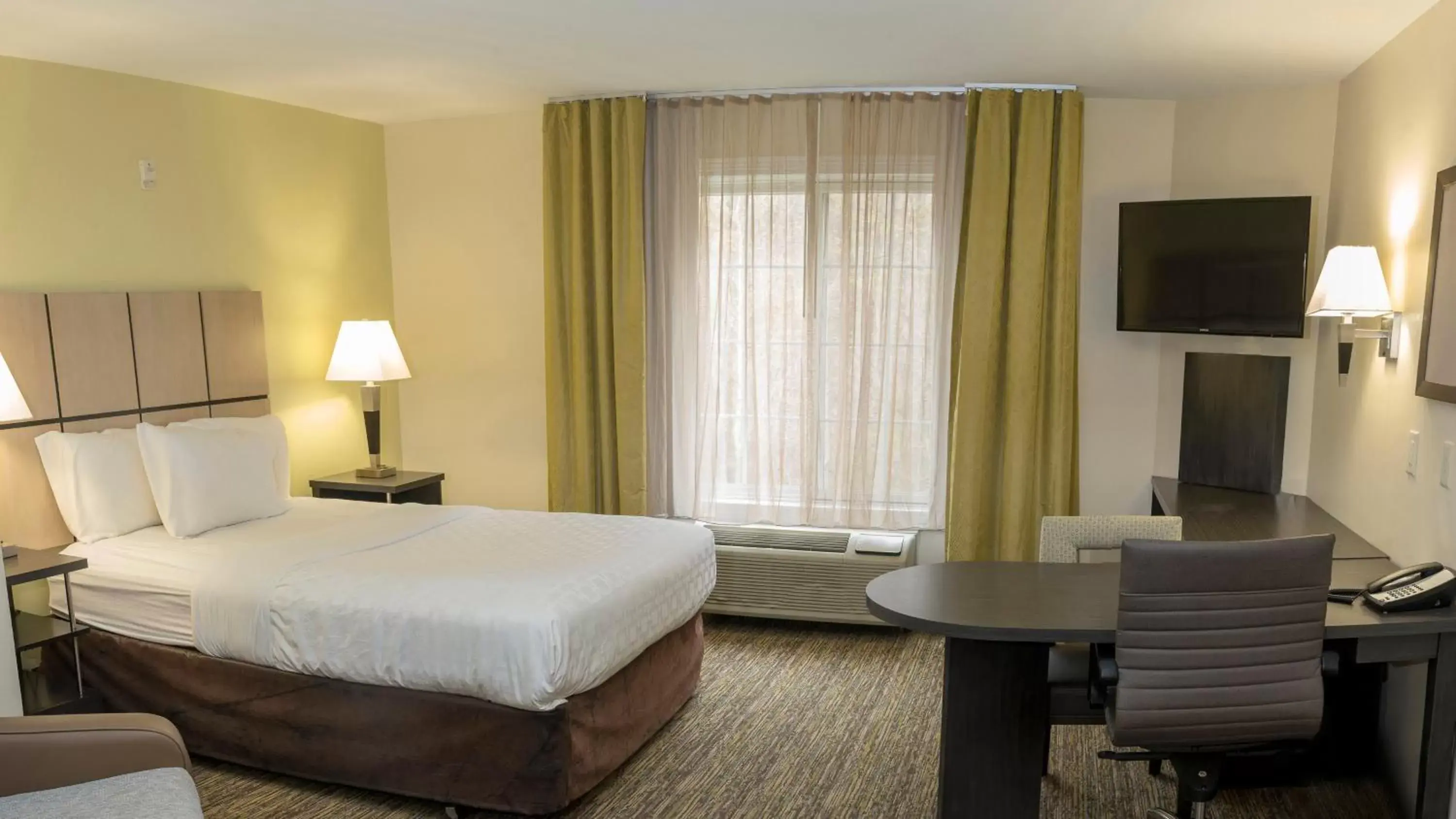Photo of the whole room, Bed in Candlewood Suites Saint Joseph - Benton Harbor, an IHG Hotel
