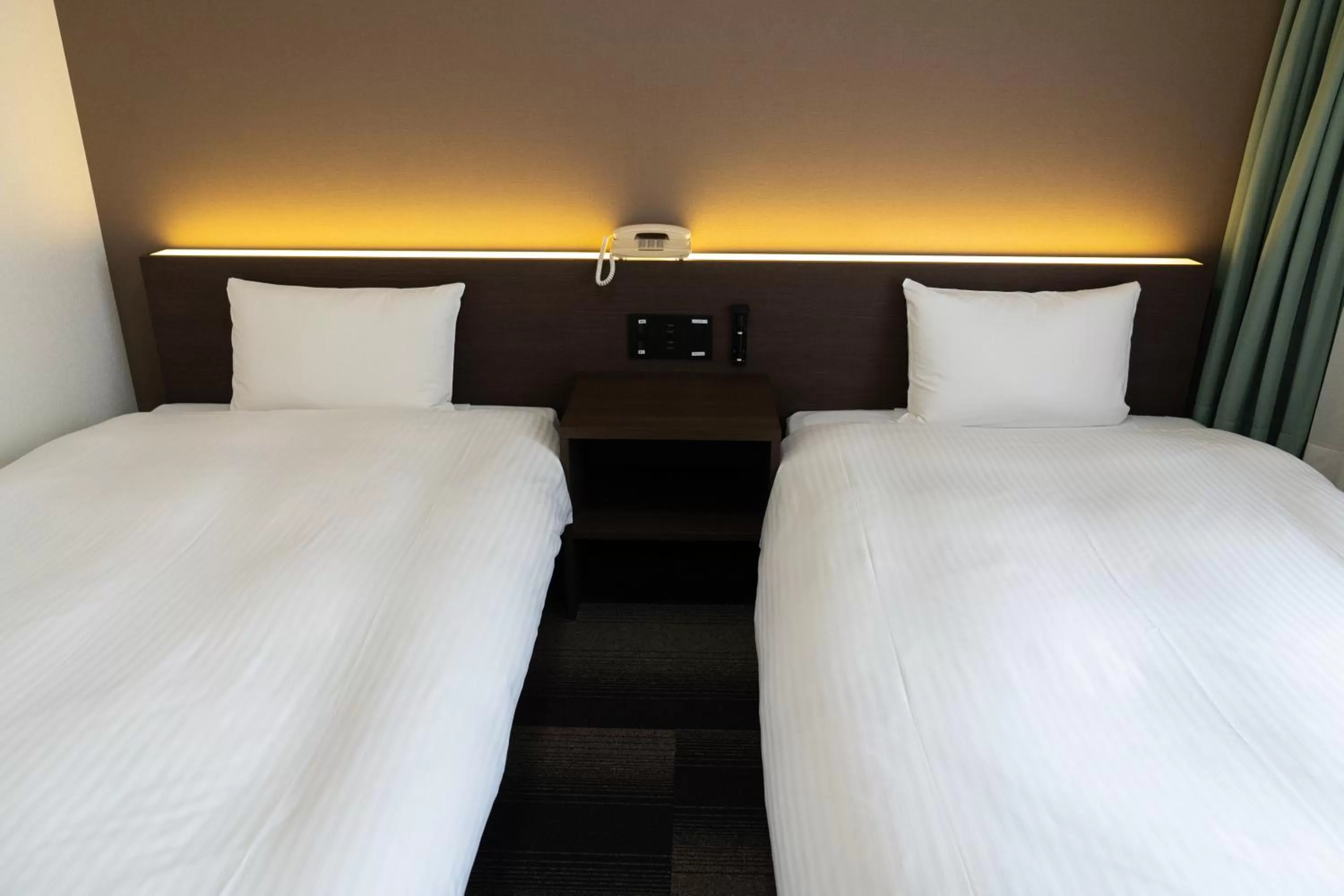 Photo of the whole room, Bed in Heiwadai Hotel Tenjin