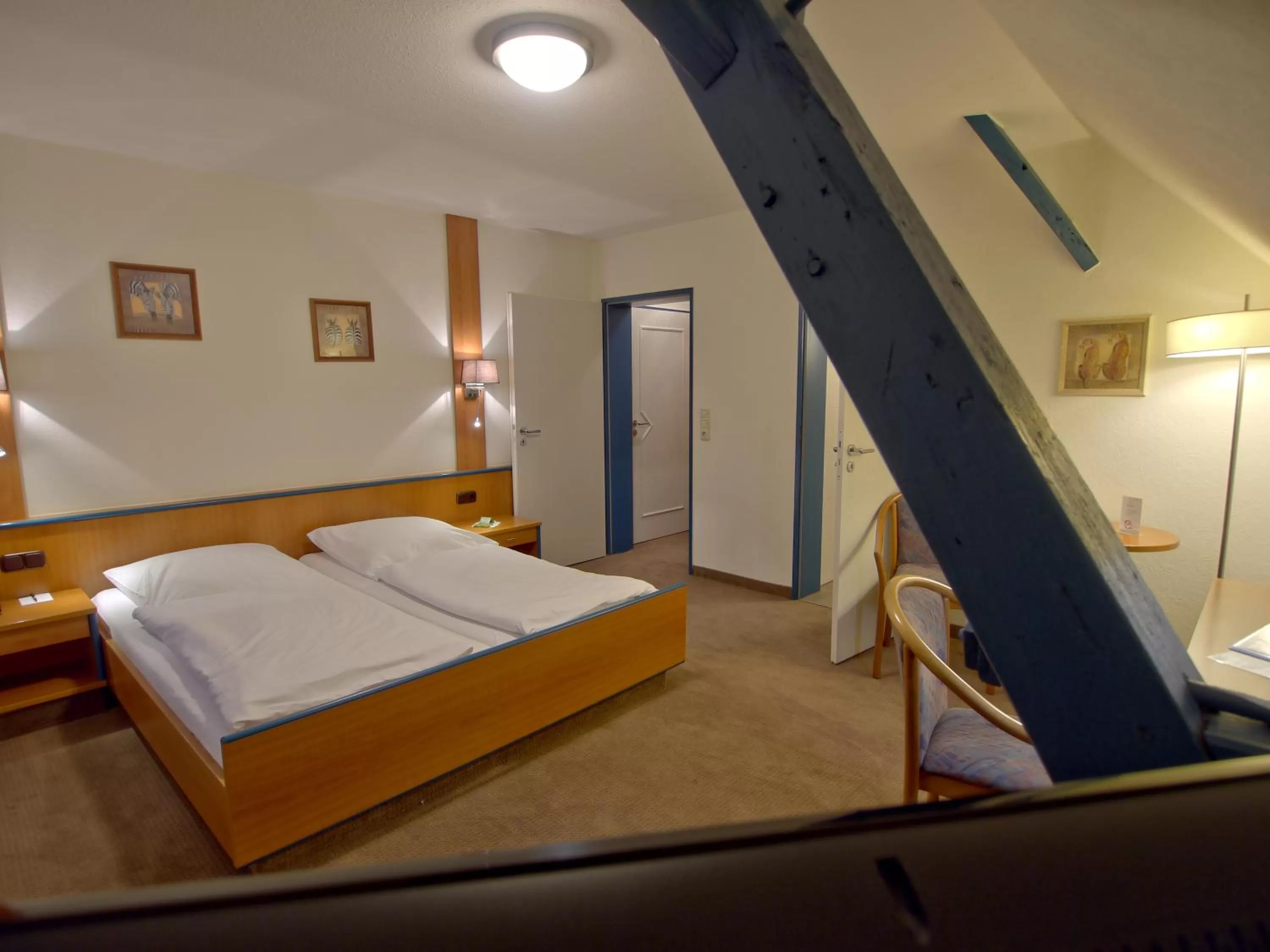 Bed in Hotel Friesische Wehde