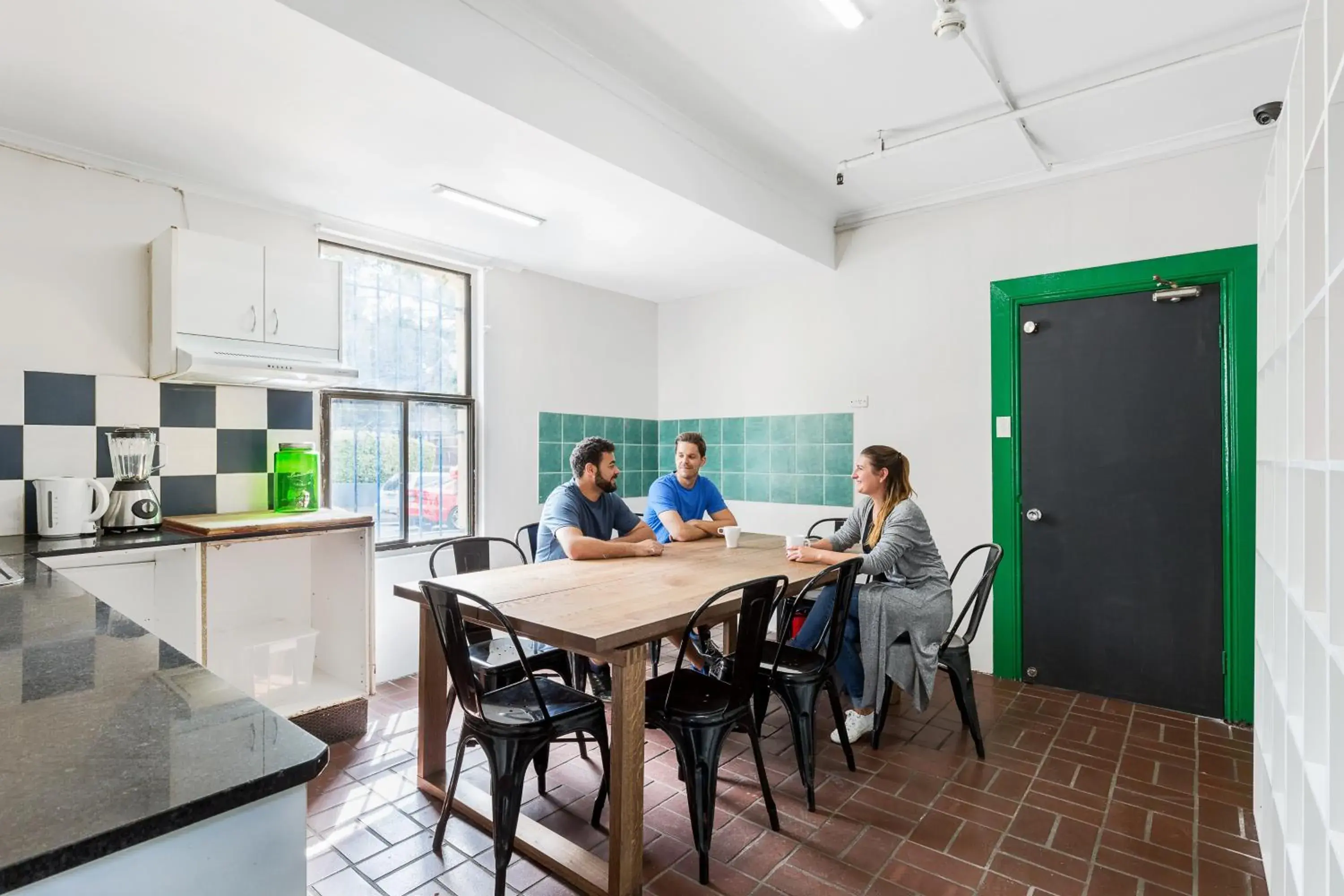 Communal kitchen, Dining Area in Secret Garden Backpackers, Sydney