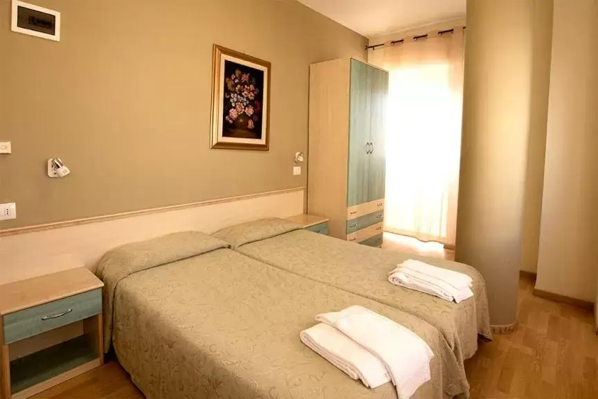 Bed in Hotel Scacciapensieri