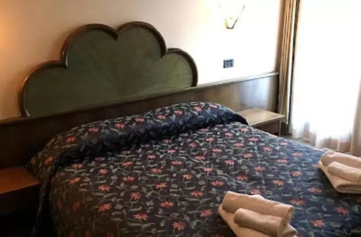 Bed in Hotel Quadrifoglio