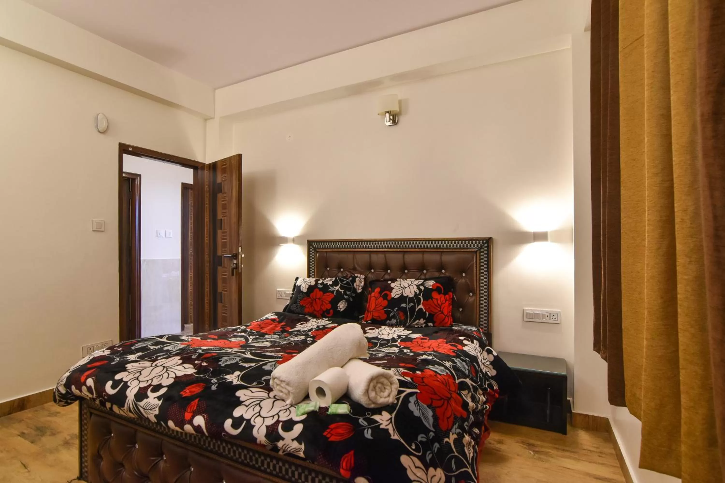 Bedroom, Bed in Dhanlaxmi Apartments