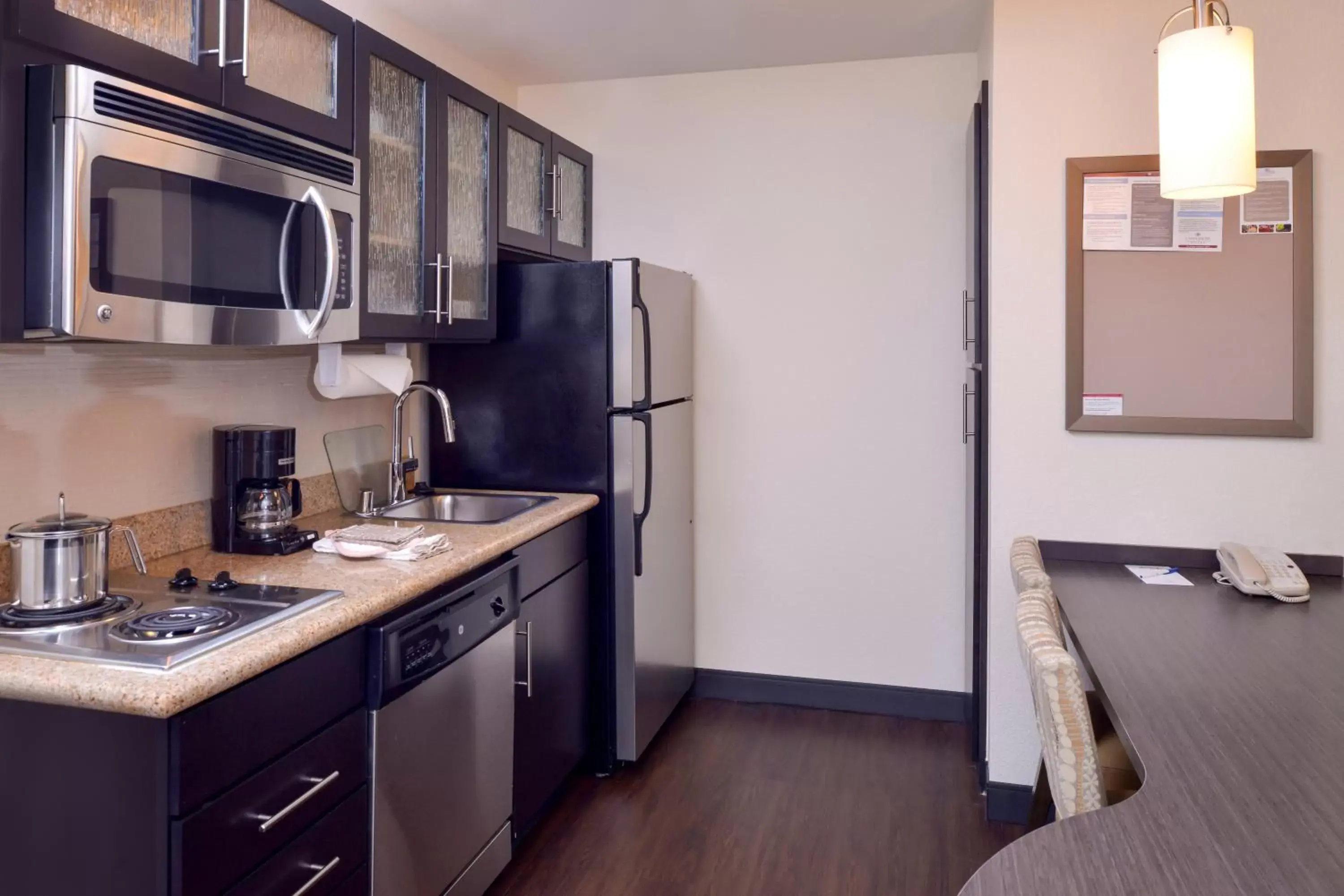 Kitchen or kitchenette, Kitchen/Kitchenette in Candlewood Suites Paducah, an IHG Hotel