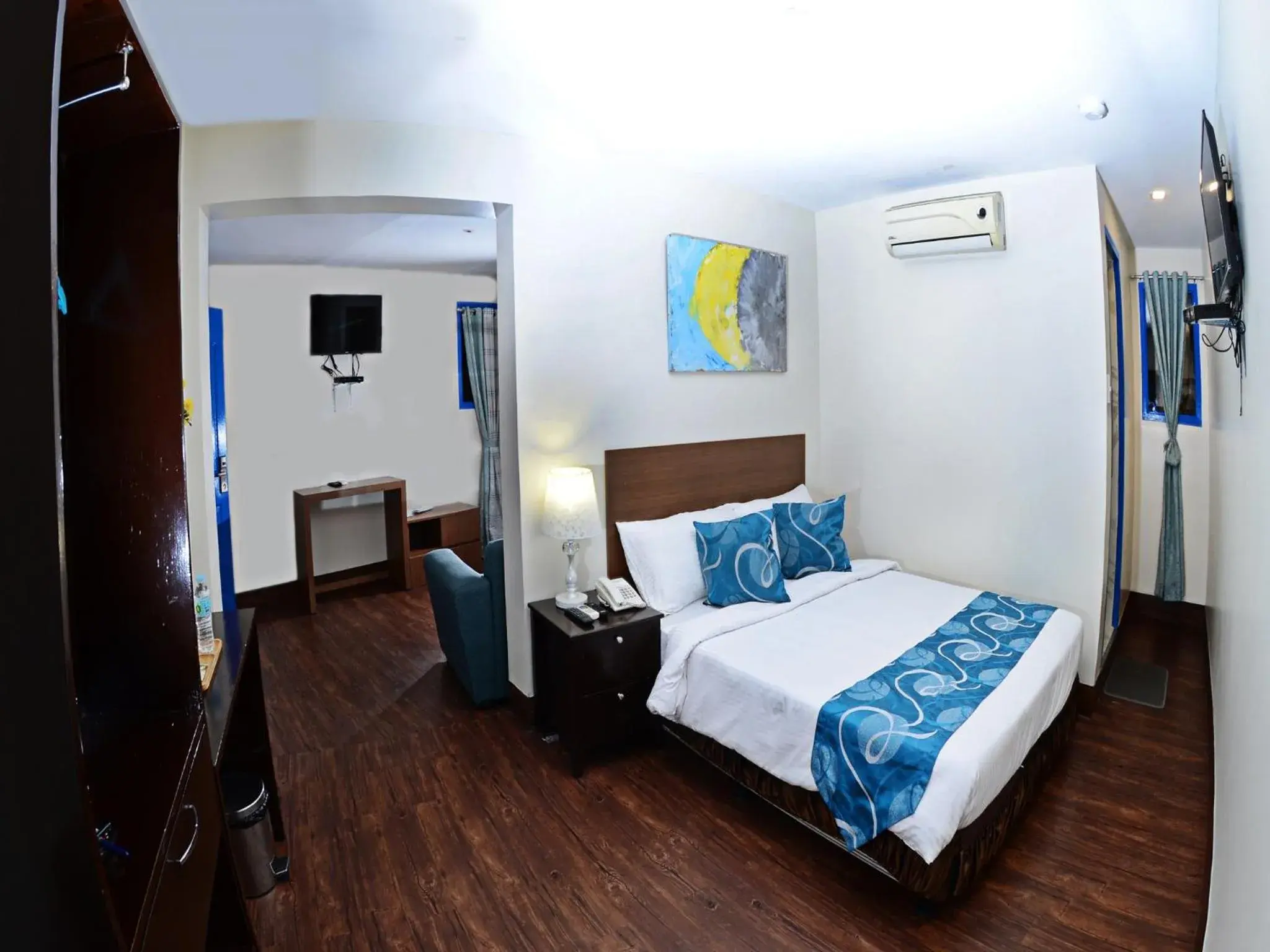 Bedroom in Skyblue Hotel