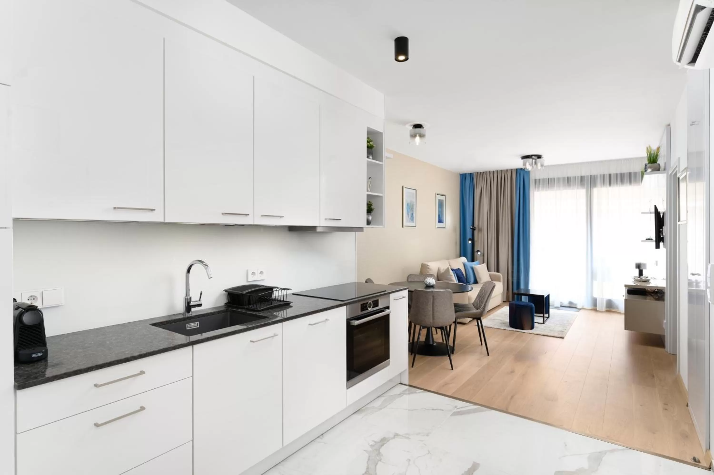 Living room in Emerald Downtown Luxury Suites by Continental Group