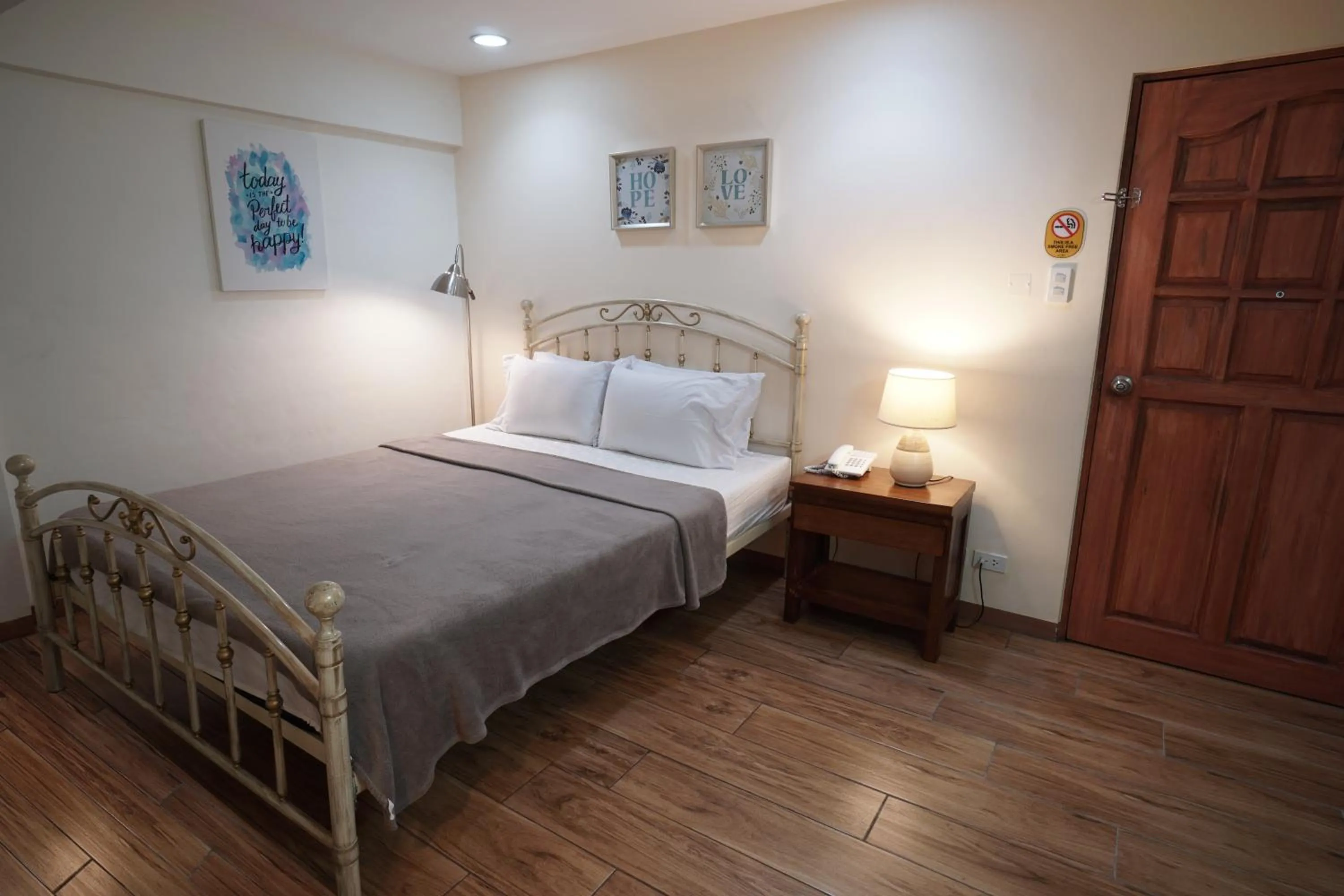 Bed in 1775 Adriatico Suites