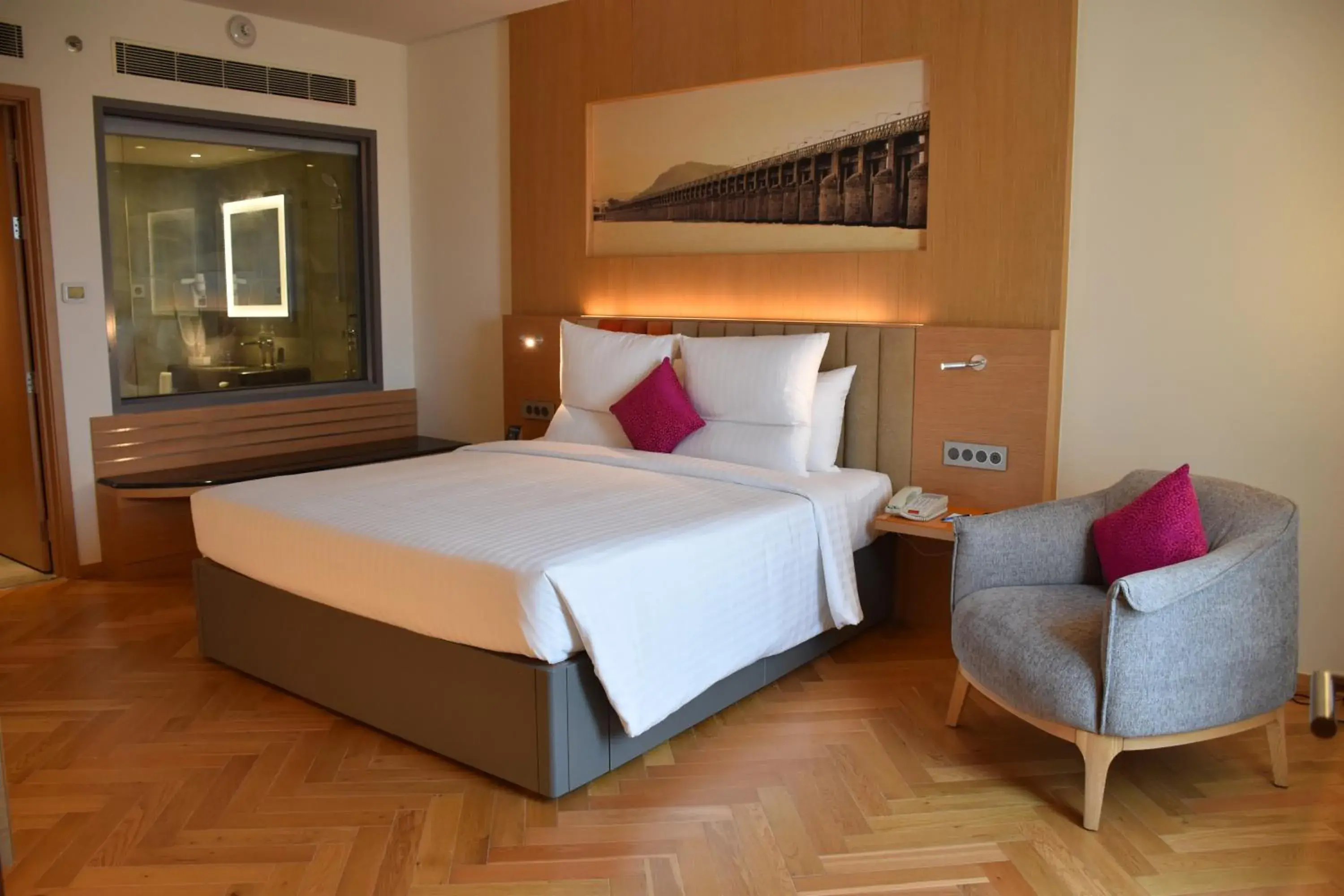 Bed in Novotel Vijayawada Varun