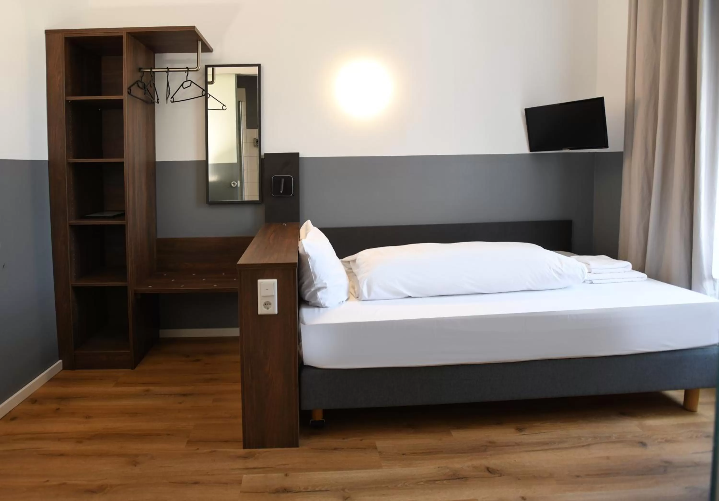 Bed in Hotel Apadana Frankfurt