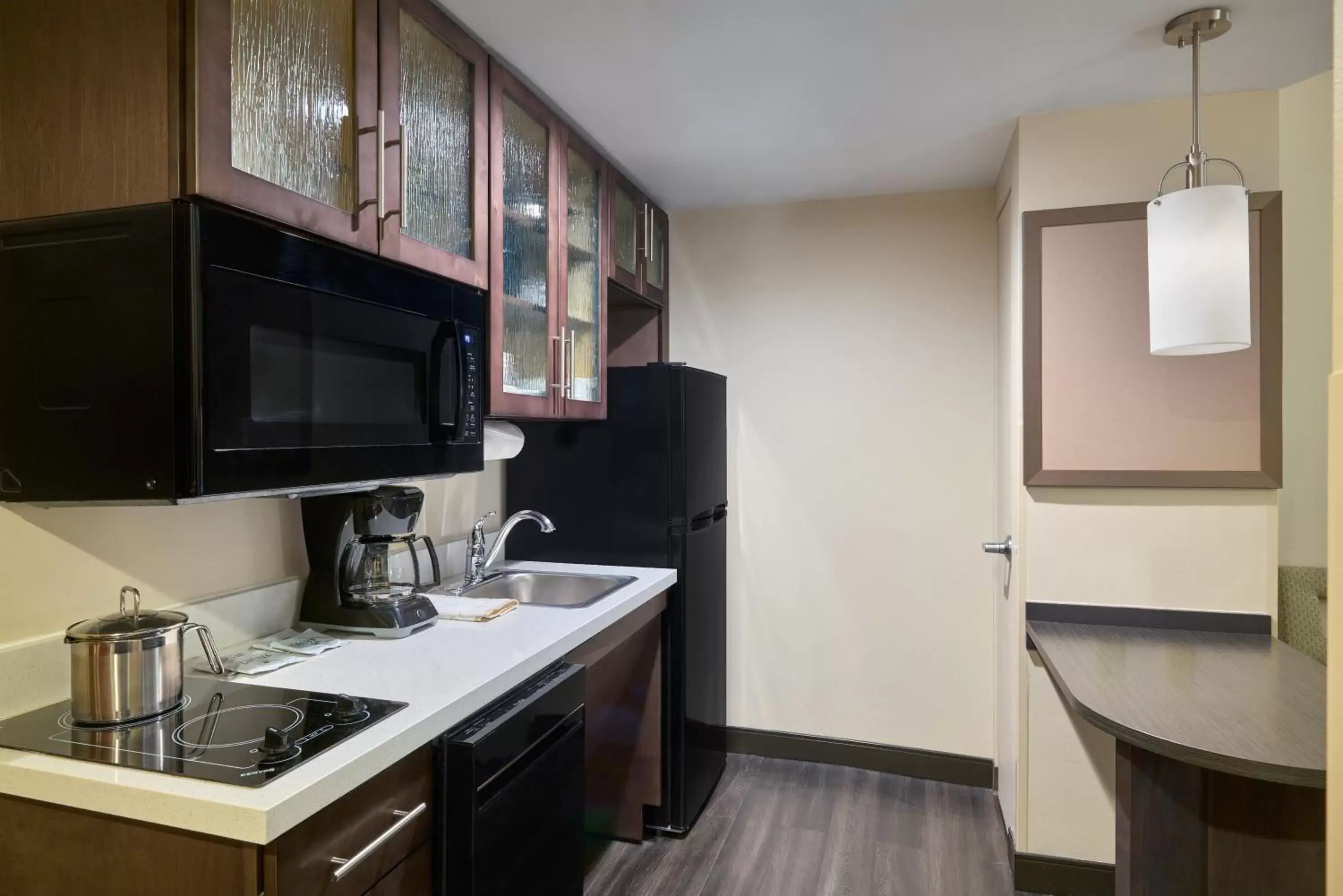 kitchen, Kitchen/Kitchenette in Candlewood Suites NYC -Times Square, an IHG Hotel