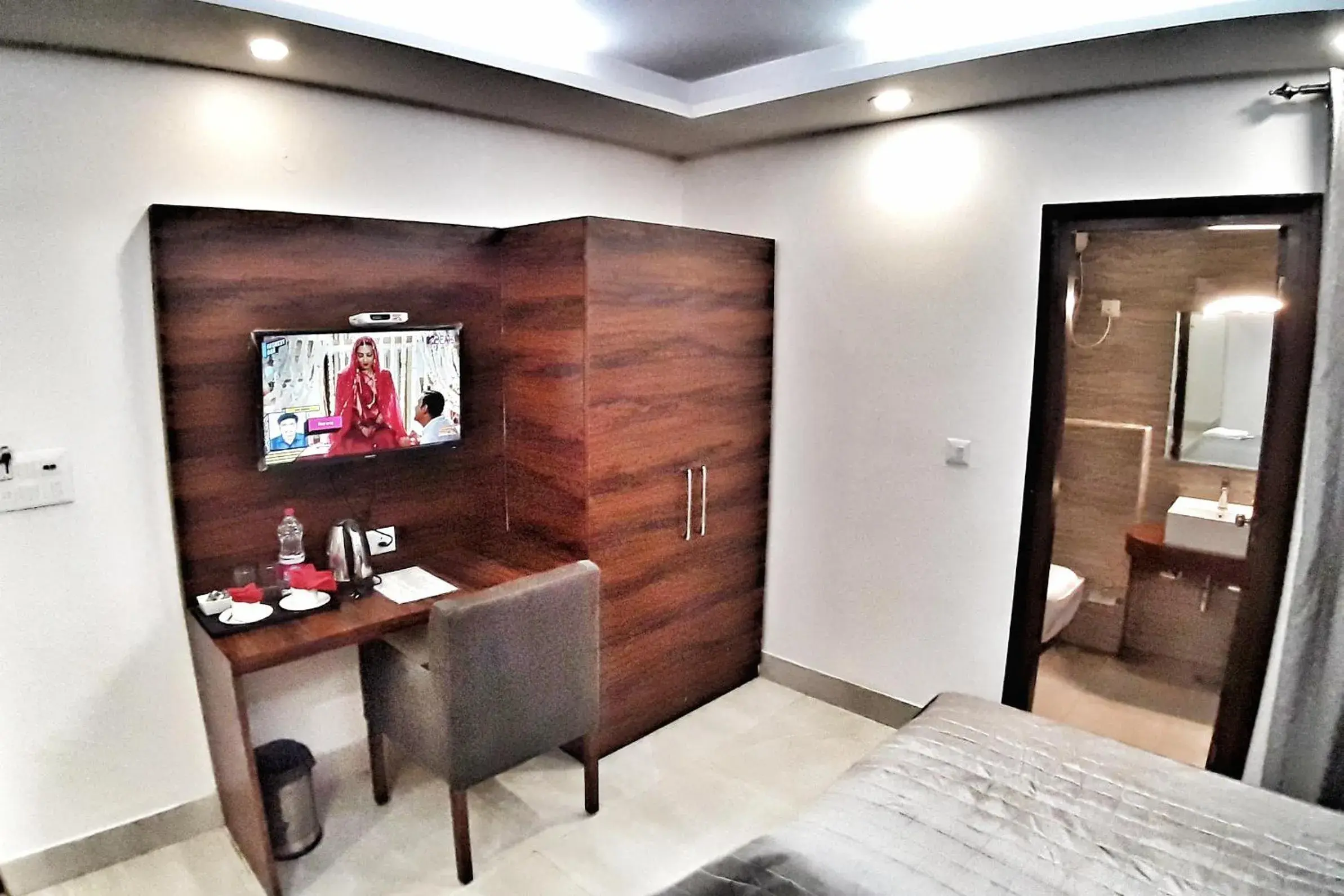 TV and multimedia, TV/Entertainment Center in Hotel Aerocity Purple Orchid