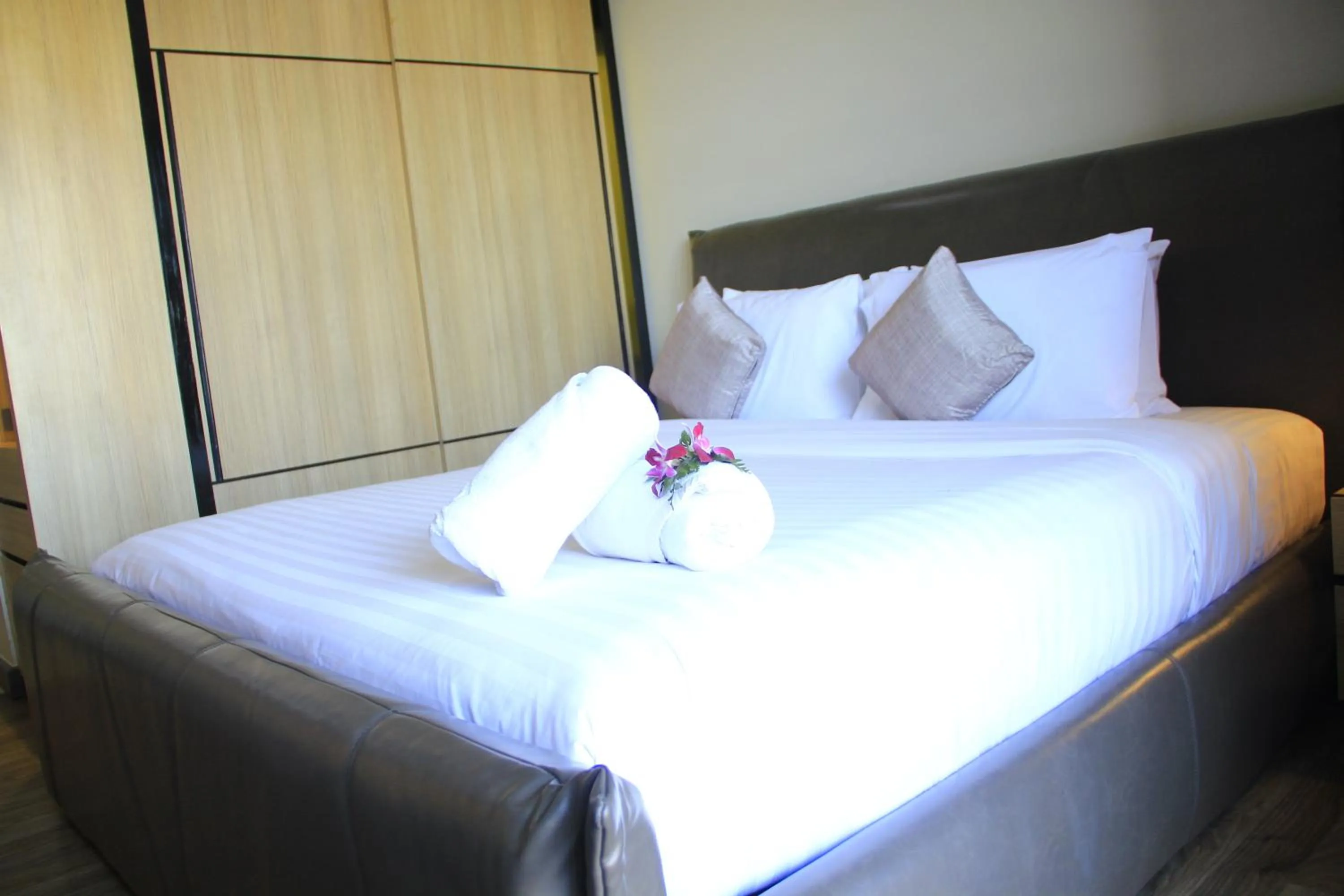 Bed in Wellness Chiang Mai Hotel