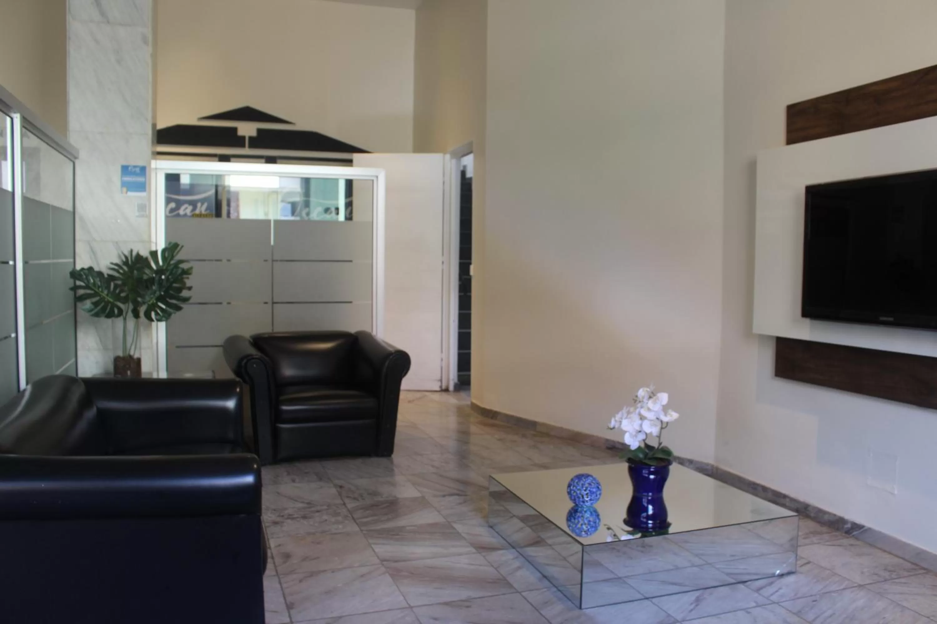 Living room in Hotel Oscar Blue Montes Claros