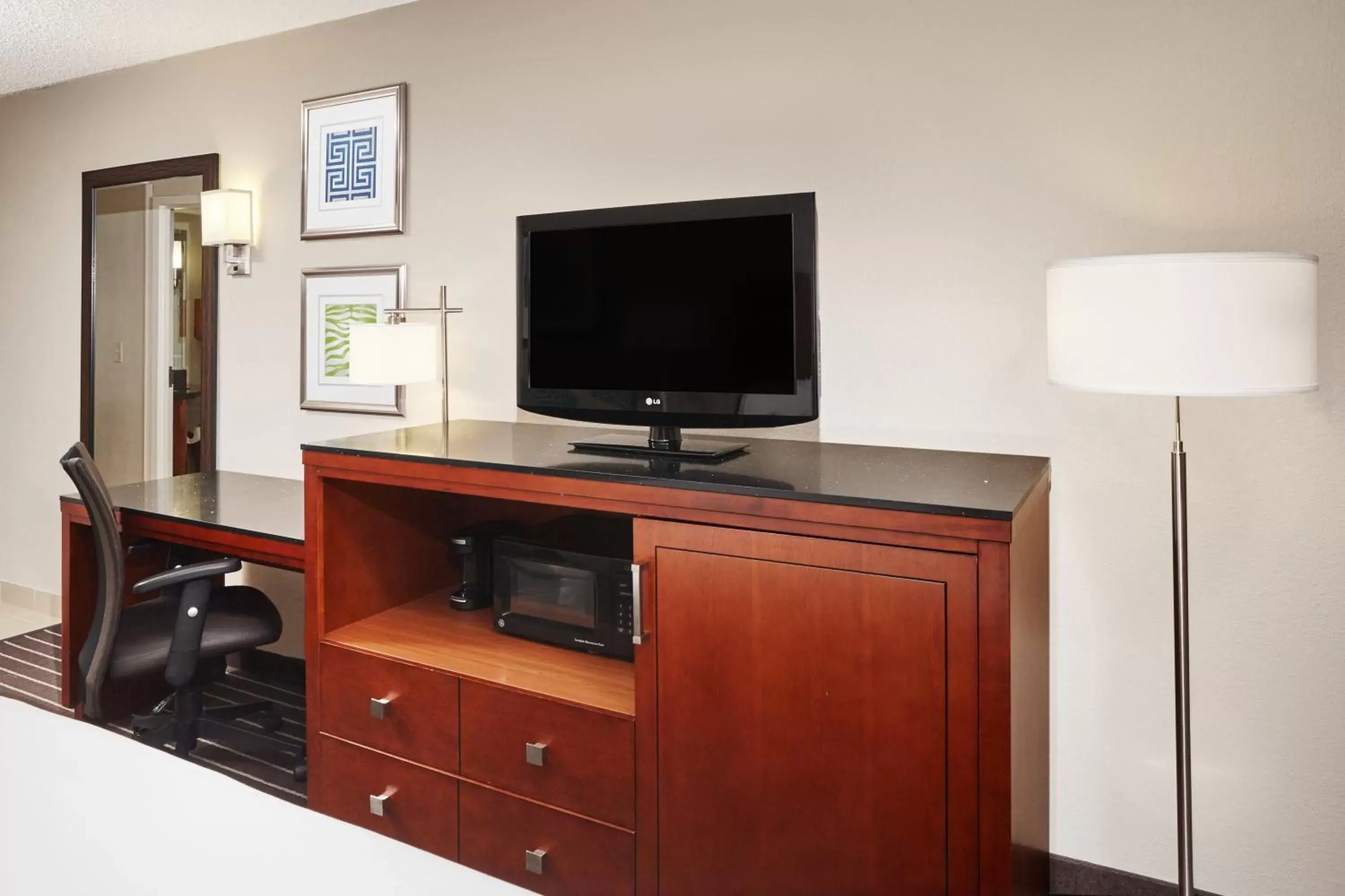 Photo of the whole room, TV/Entertainment Center in Holiday Inn Express Hotels- Hampton, an IHG Hotel