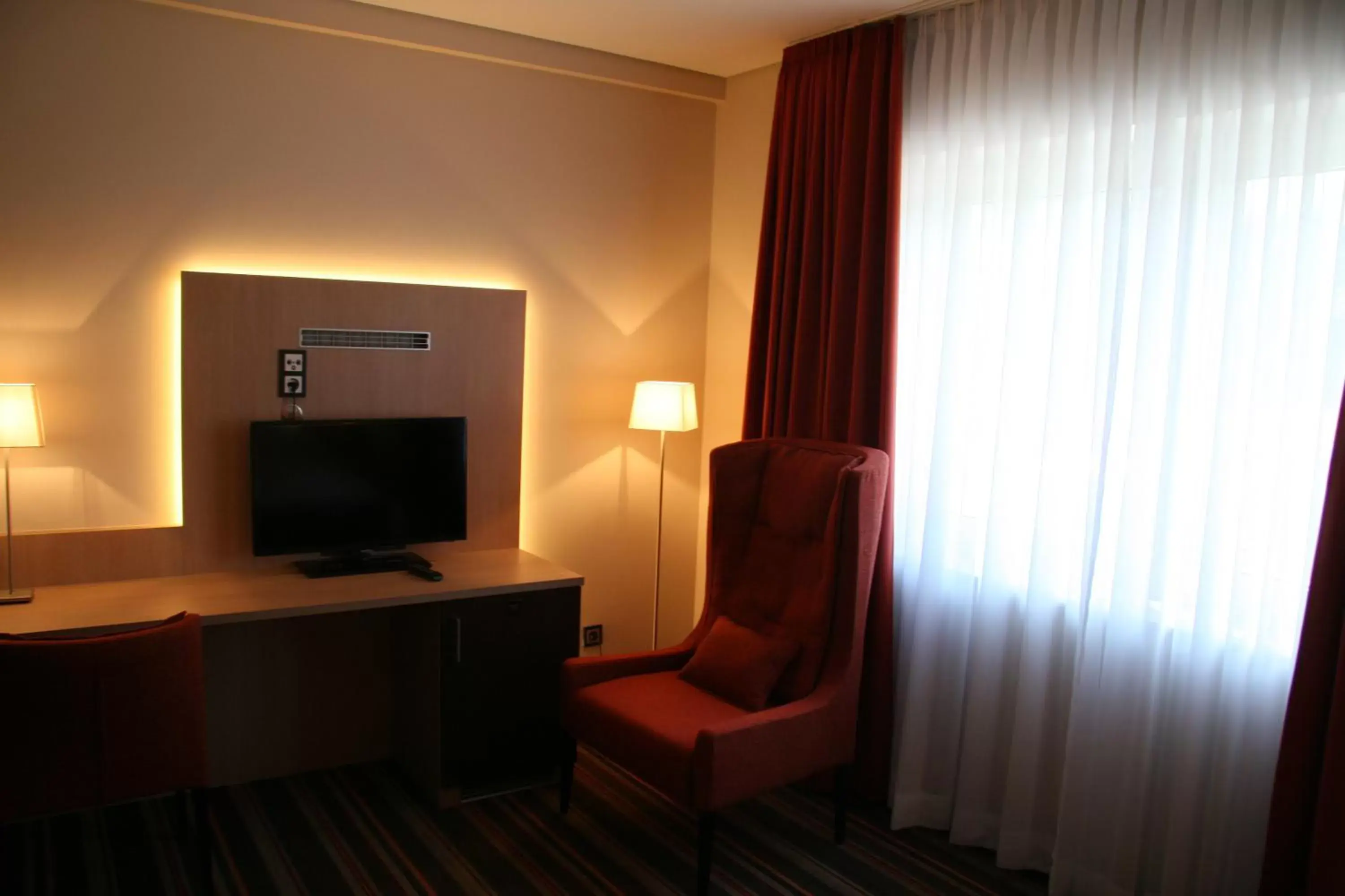 TV and multimedia, TV/Entertainment Center in Hotel Fortune