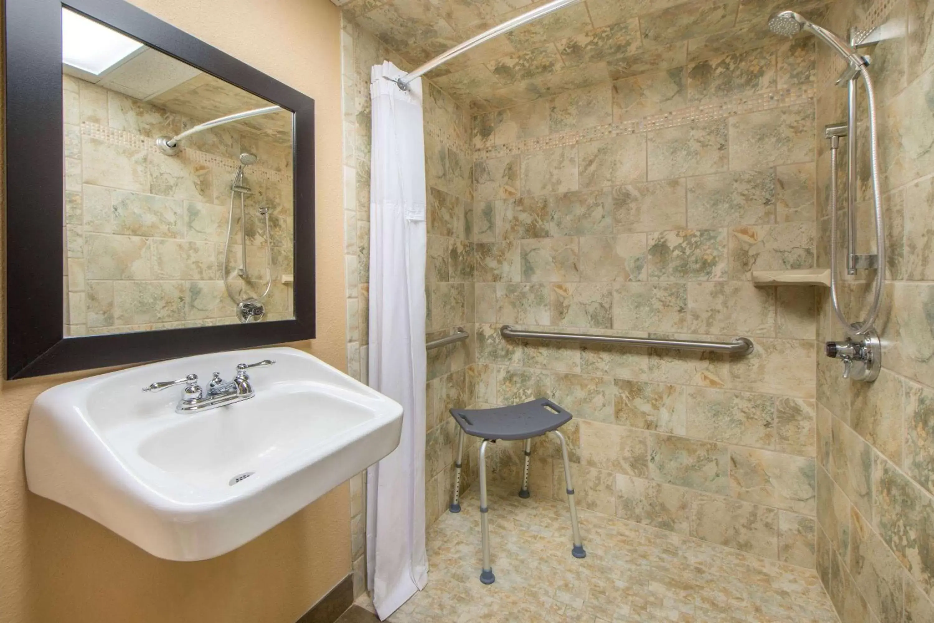 Shower, Bathroom in Wyndham Garden Oklahoma City Airport Near Downtown