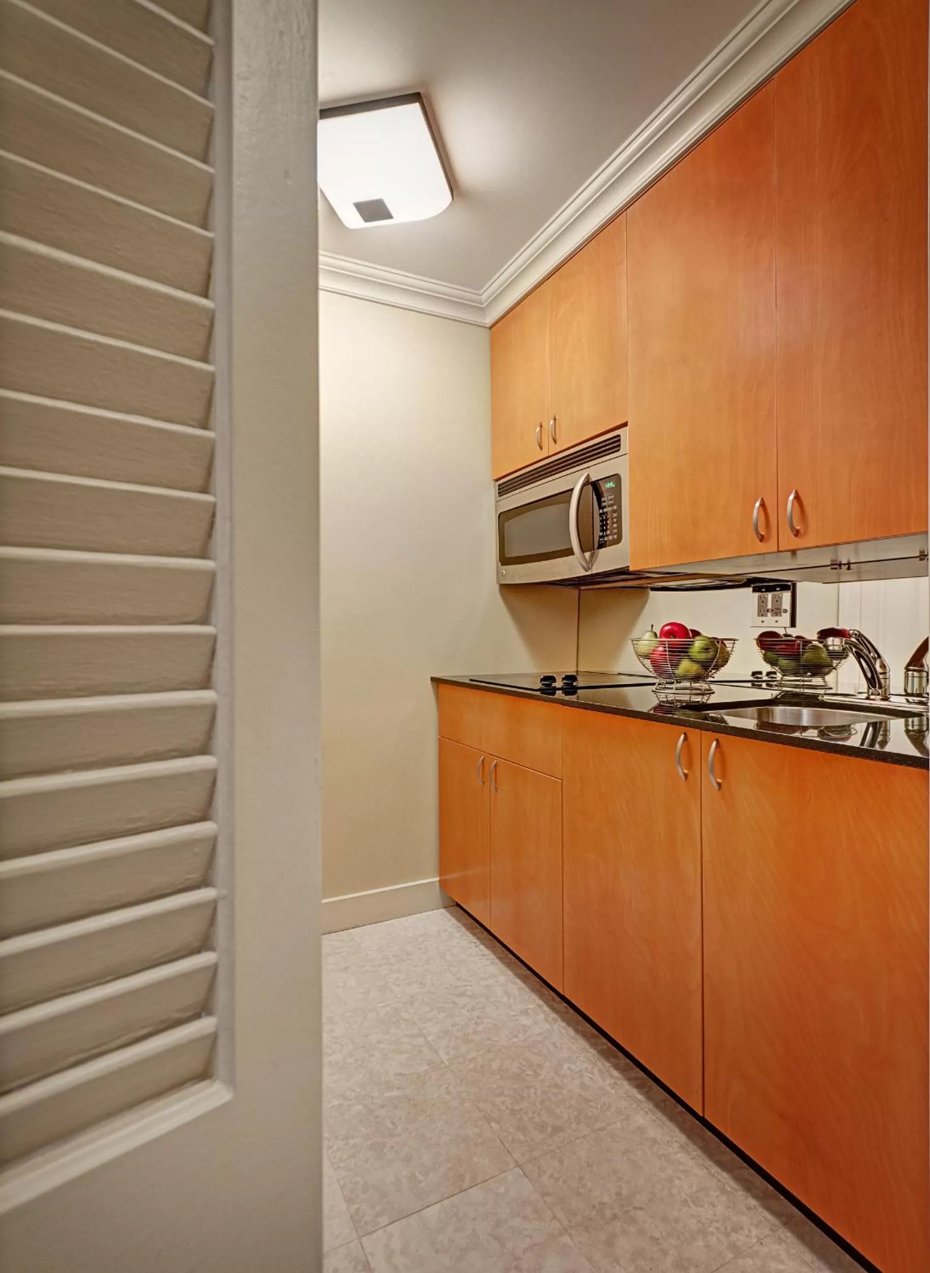 Kitchen or kitchenette in Hotel Elysee by Library Hotel Collection