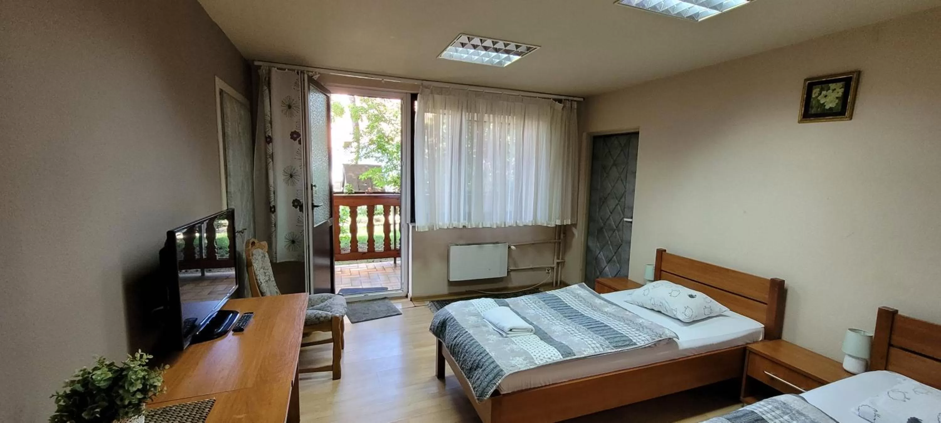 Bed in Dworek Pokoje Gościnne